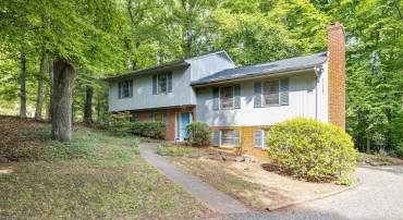 Tucked at the end of q quiet cul-de-sac in coveted Greenbrier