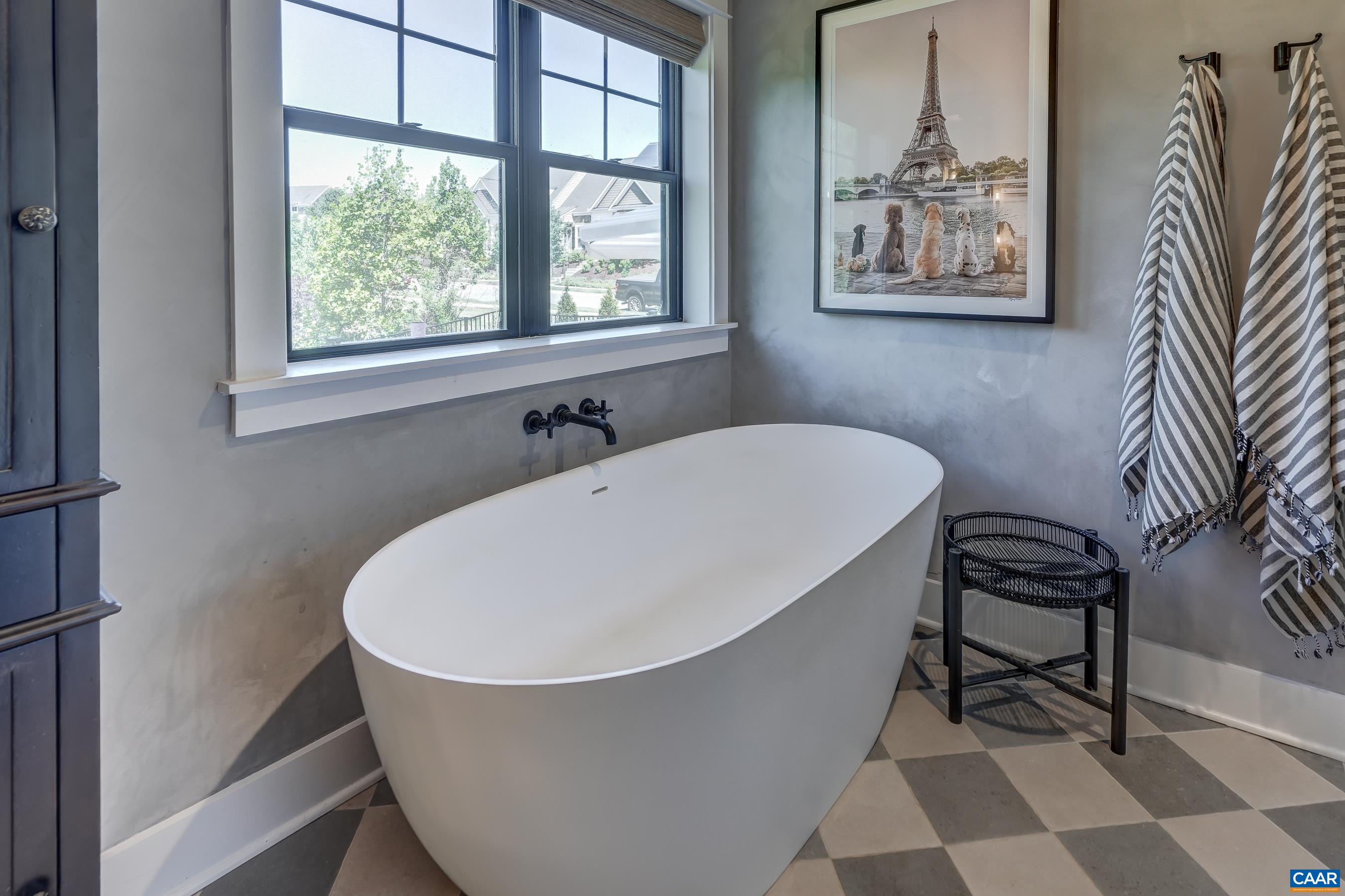 Relax in the free standing soaking tub. Relax in the free standing soaking tub.