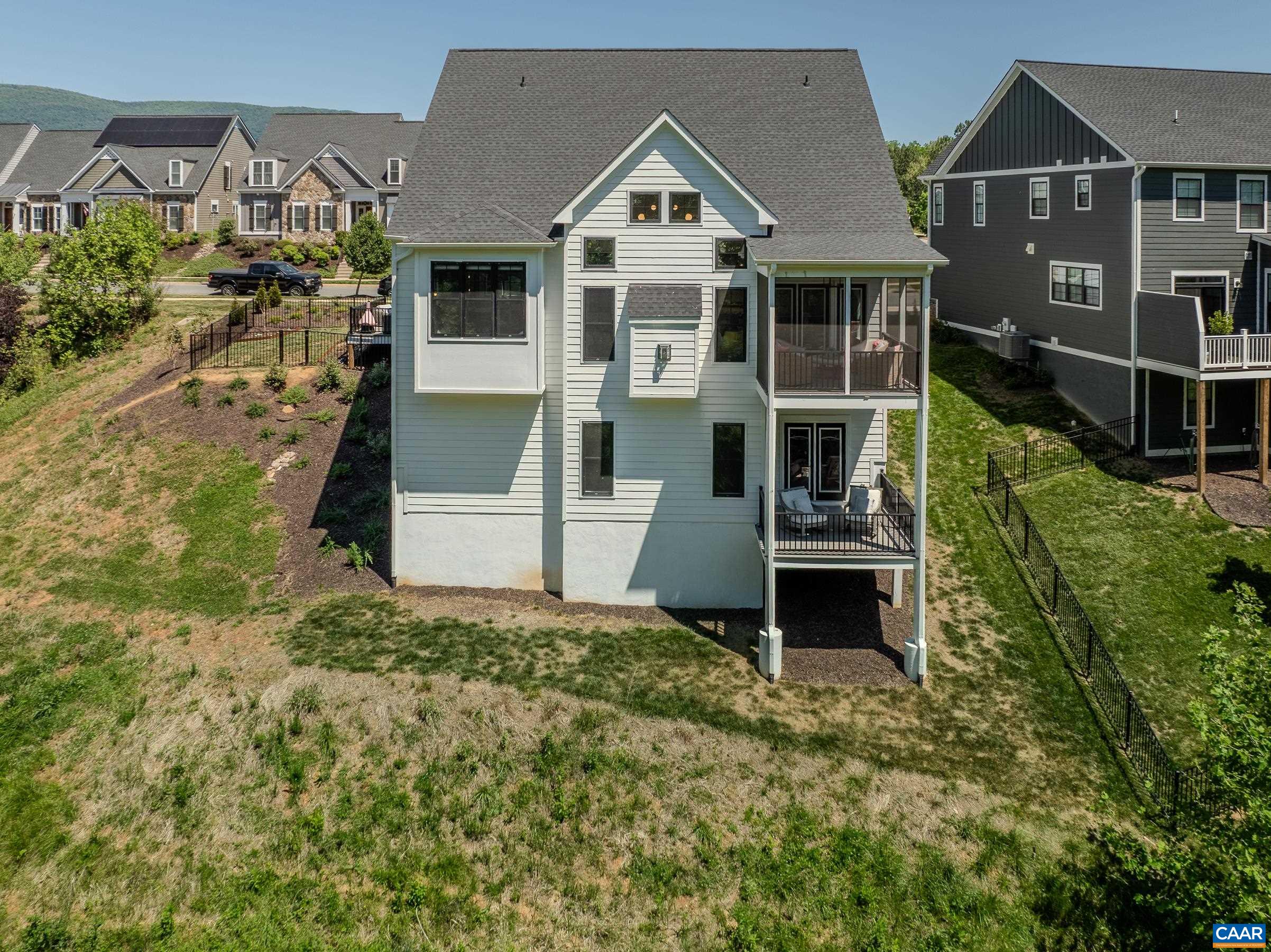 Two levels of outdoor living at the rear of the home, with a fenced side yard and composite deck. Two levels of outdoor living at the rear of the home, with a fenced side yard and composite deck.