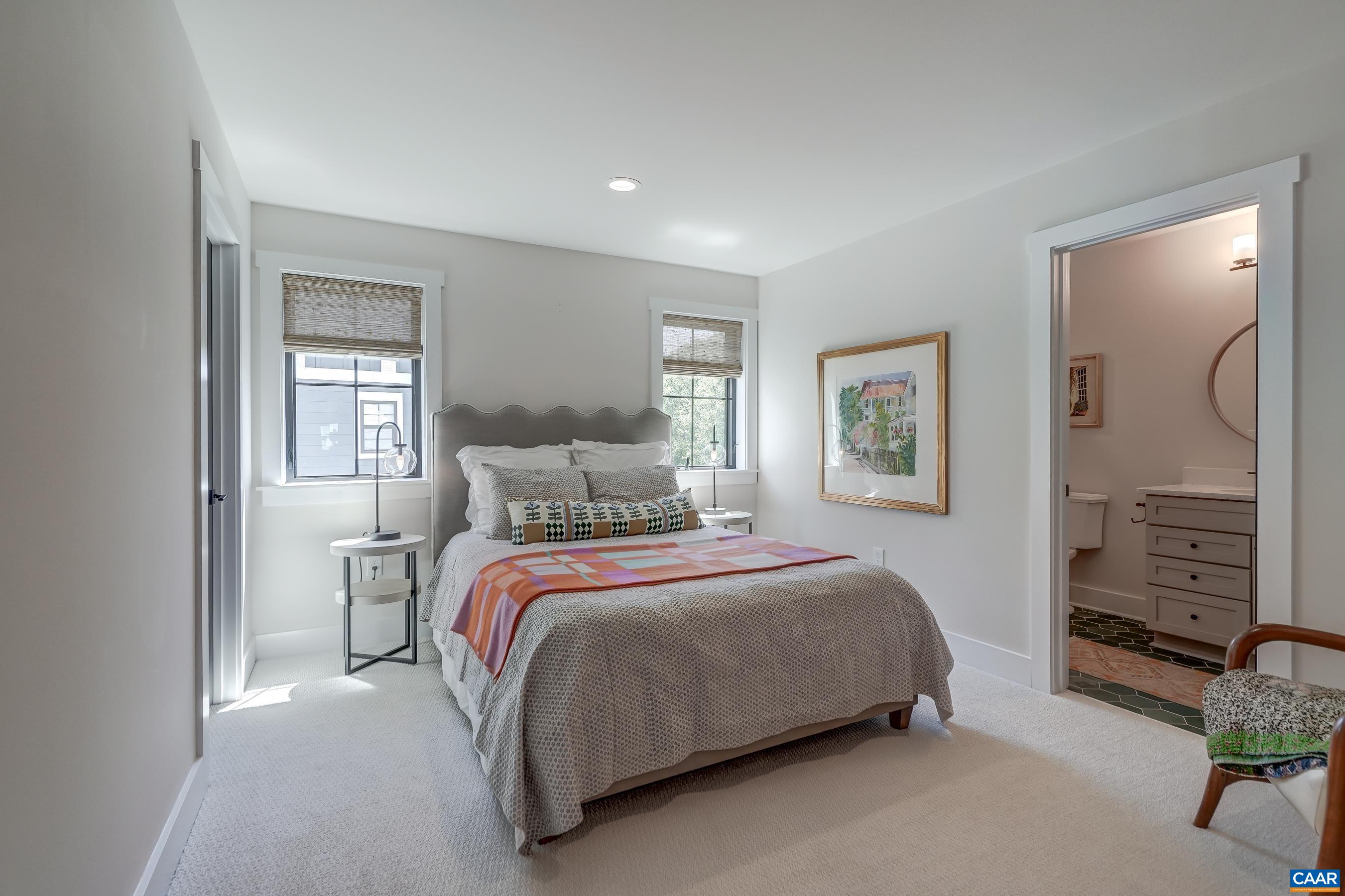 Guest bedroom features an ensuite bathroom - or make this a second primary suite. Guest bedroom features an ensuite bathroom - or make this a second primary suite.