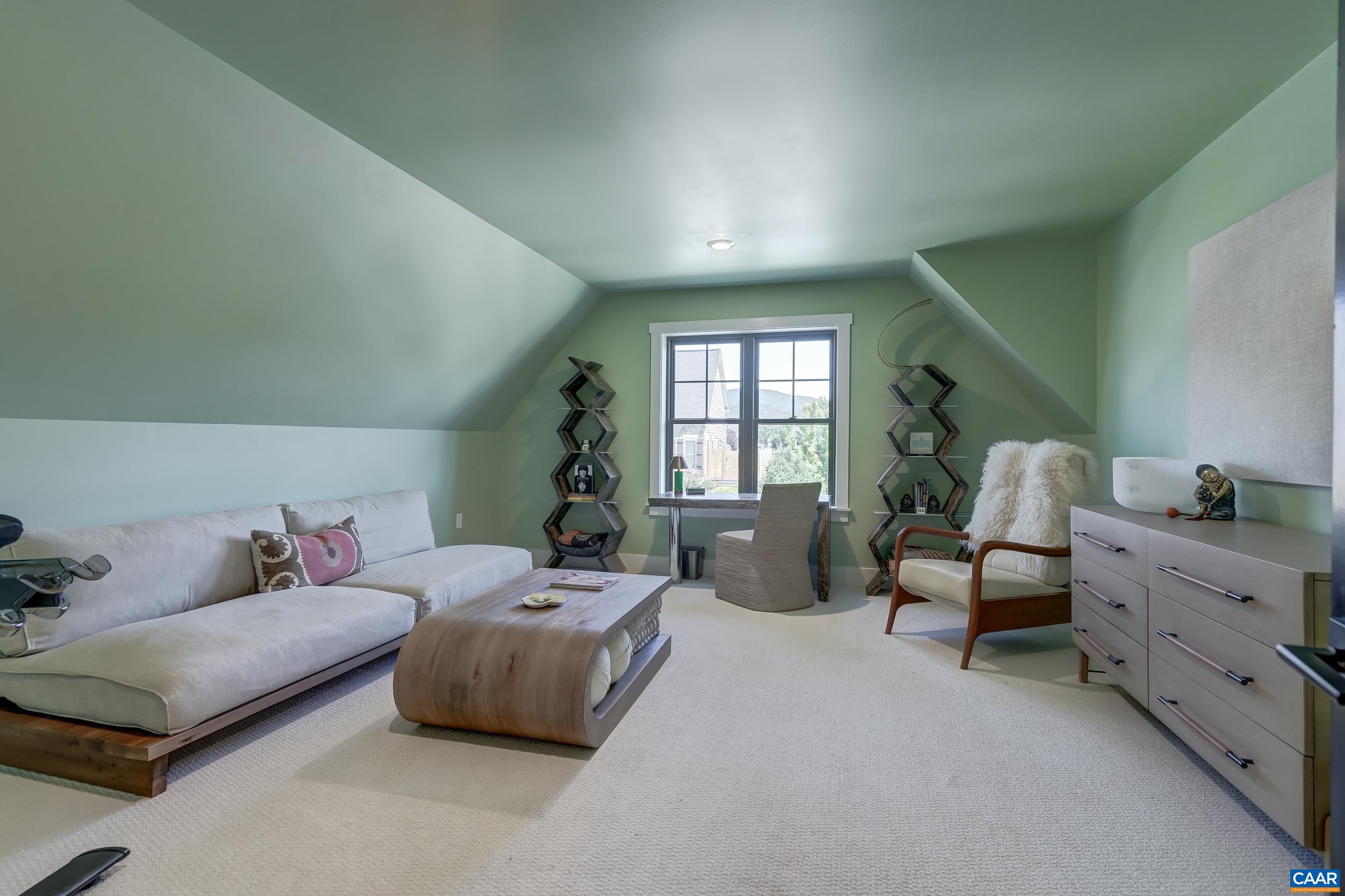 Finished bonus room above garage could be a fourth bedroom and features a mini split for year-round comfort. Finished bonus room above garage could be a fourth bedroom and features a mini split for year-round comfort.