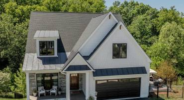 Stunning home shows like a model and backs to wooded common area for privacy!