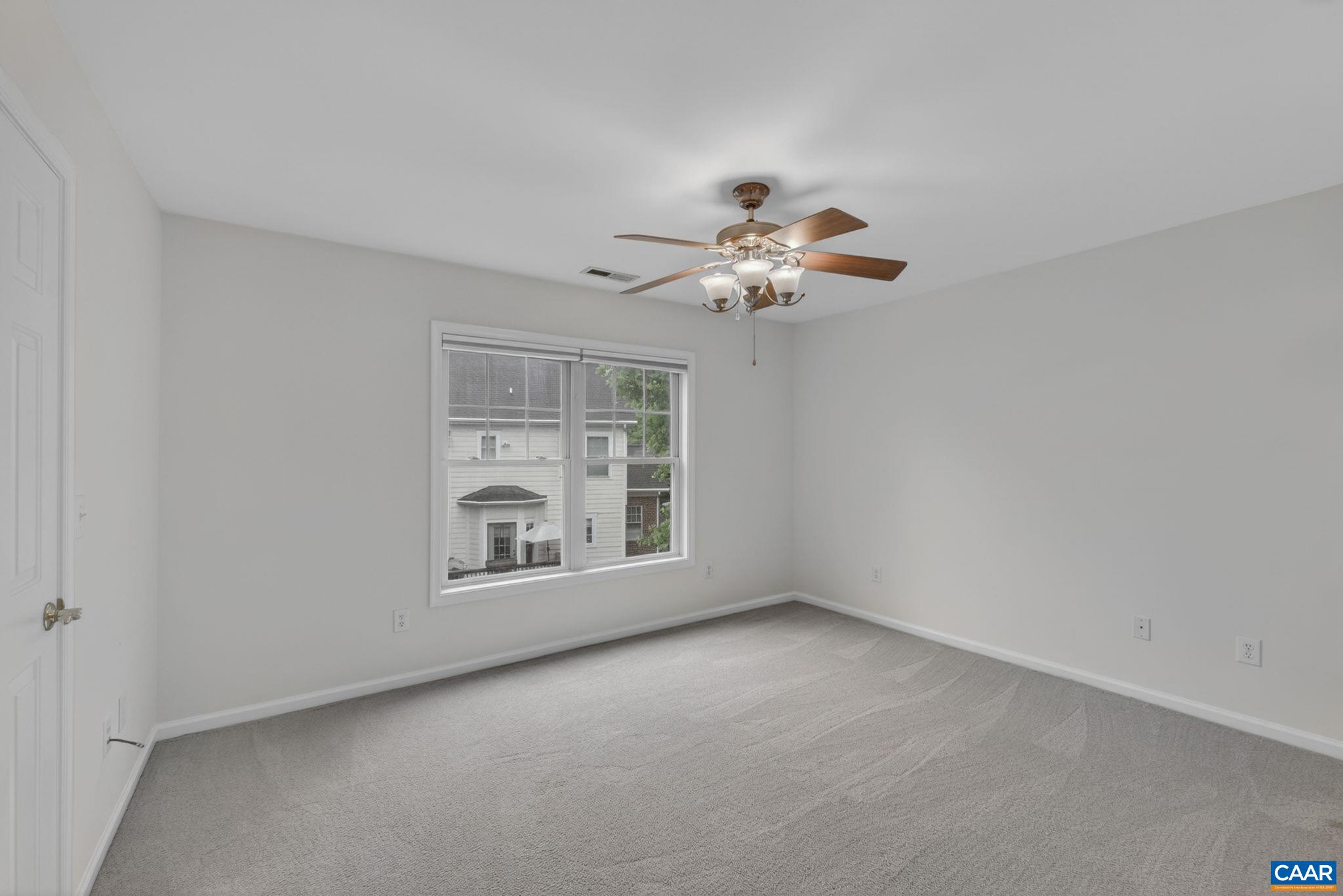 Spacious primary bedroom with ensuite bath & walk-in closet. Spacious primary bedroom with ensuite bath & walk-in closet.