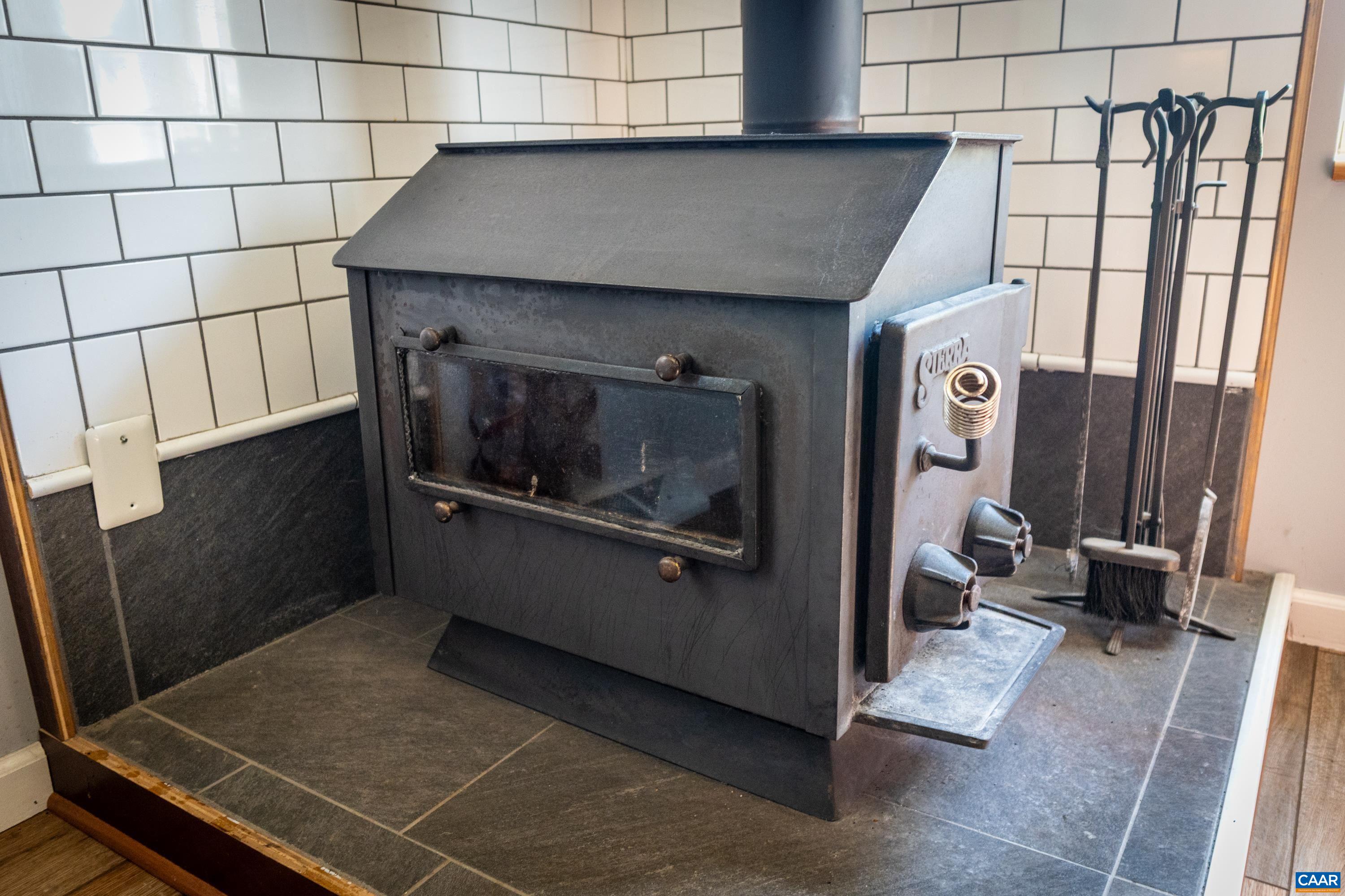Wood stove adding warmth, charm, and supplemental heat. Wood stove adding warmth, charm, and supplemental heat.