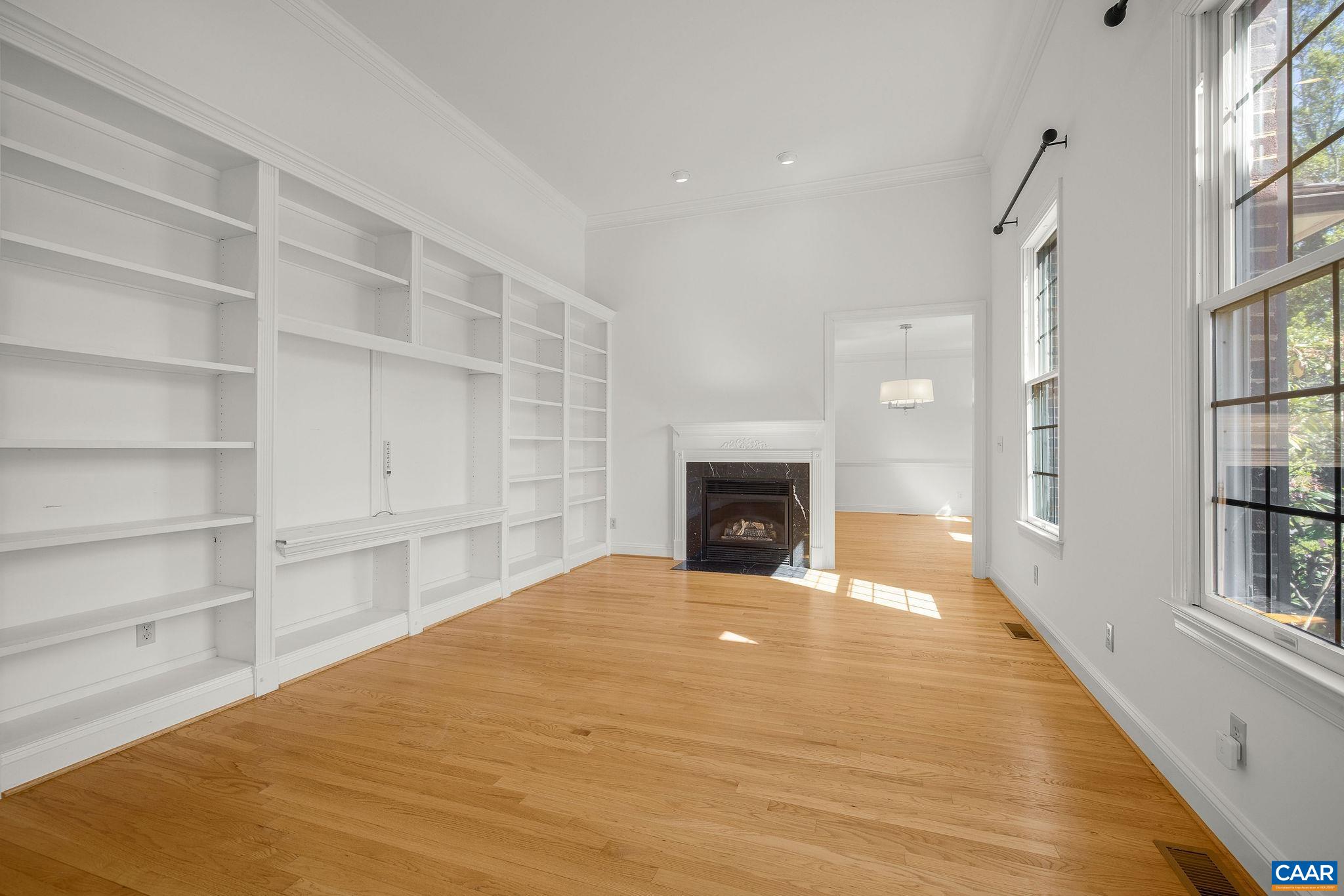 Study with built in bookcases and gas fireplace. Study with built in bookcases and gas fireplace.