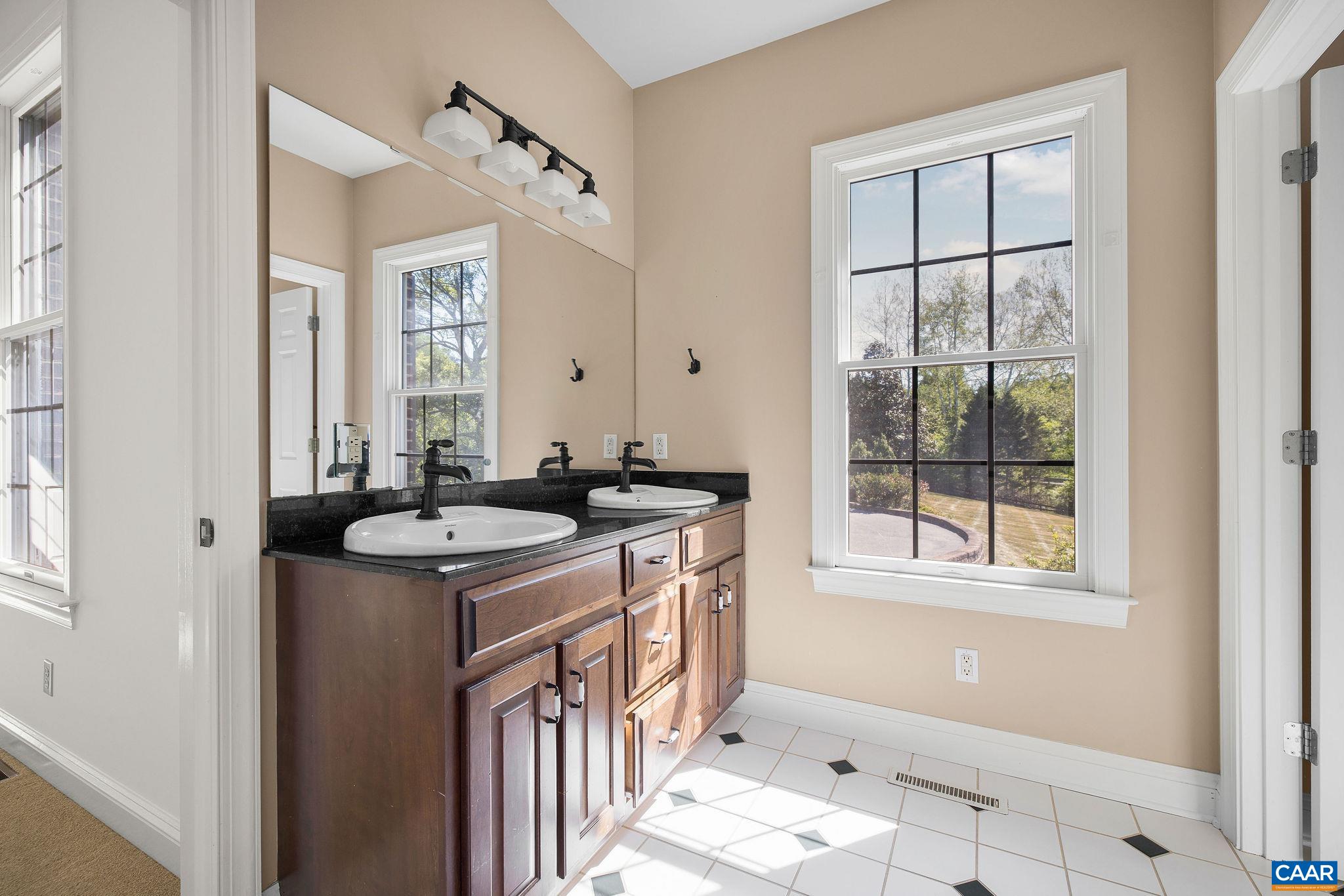 Hall bath which services both bedroom 2 and bedroom 3 Hall bath which services both bedroom 2 and bedroom 3