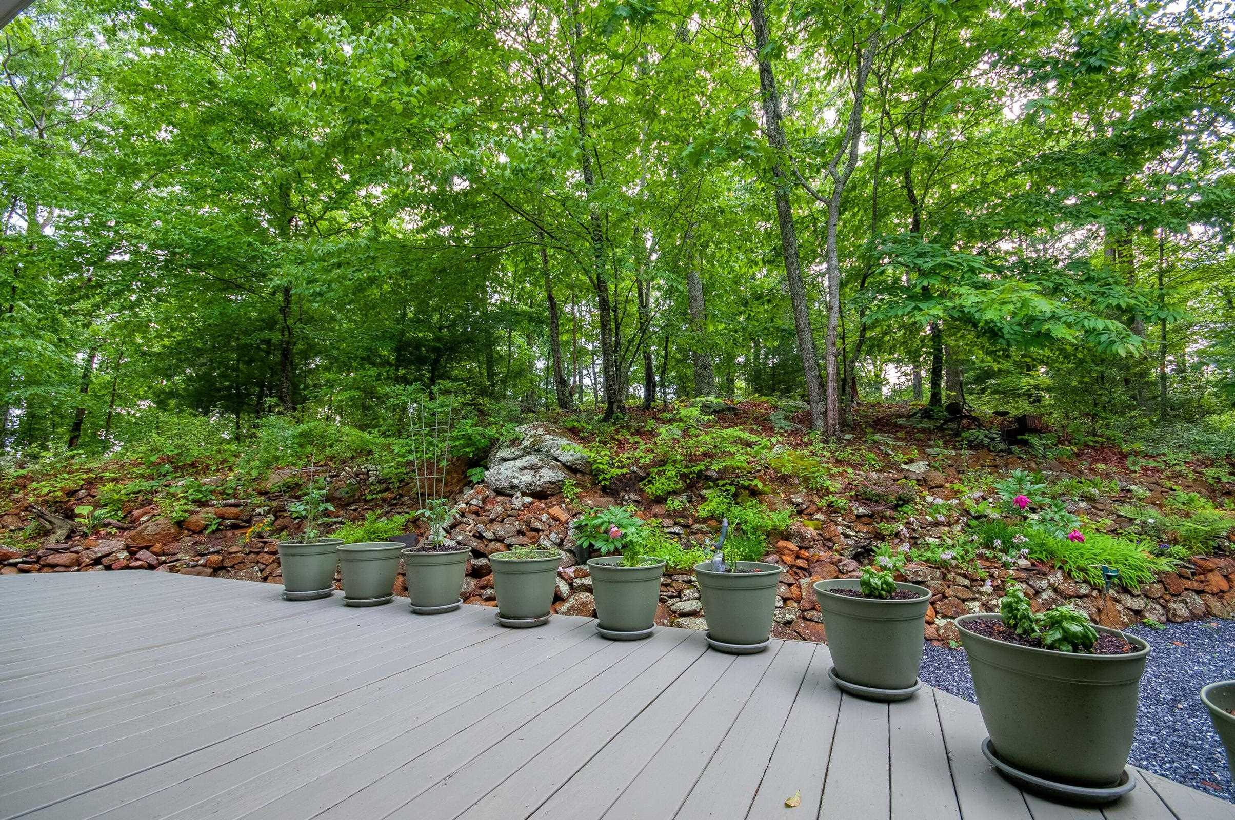No lawns to mow, the surrounds are completely in forest, rhododendron and mountain laurel. No lawns to mow, the surrounds are completely in forest, rhododendron and mountain laurel.