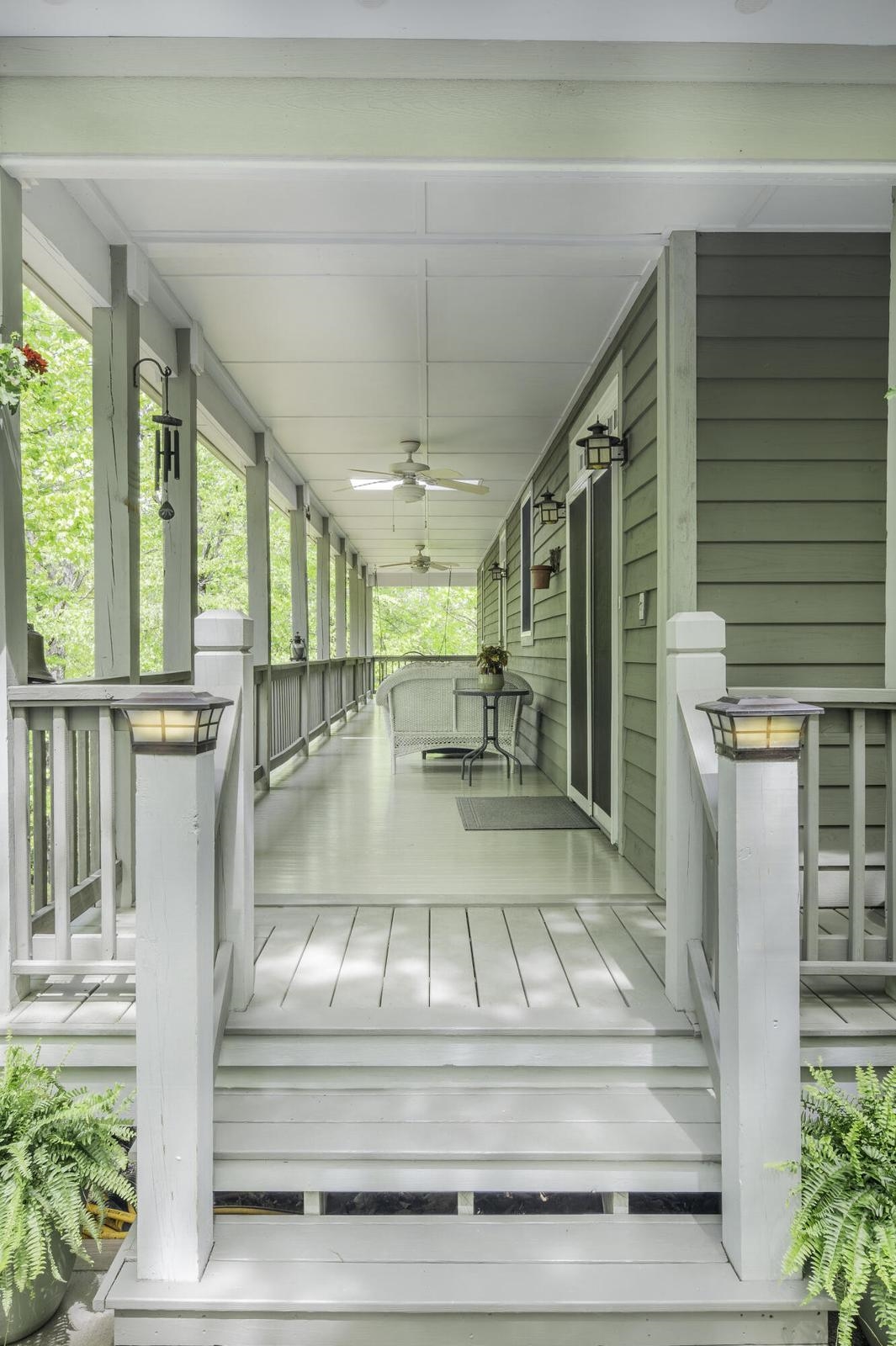 Entrance to the home via covered porch. Entrance to the home via covered porch.
