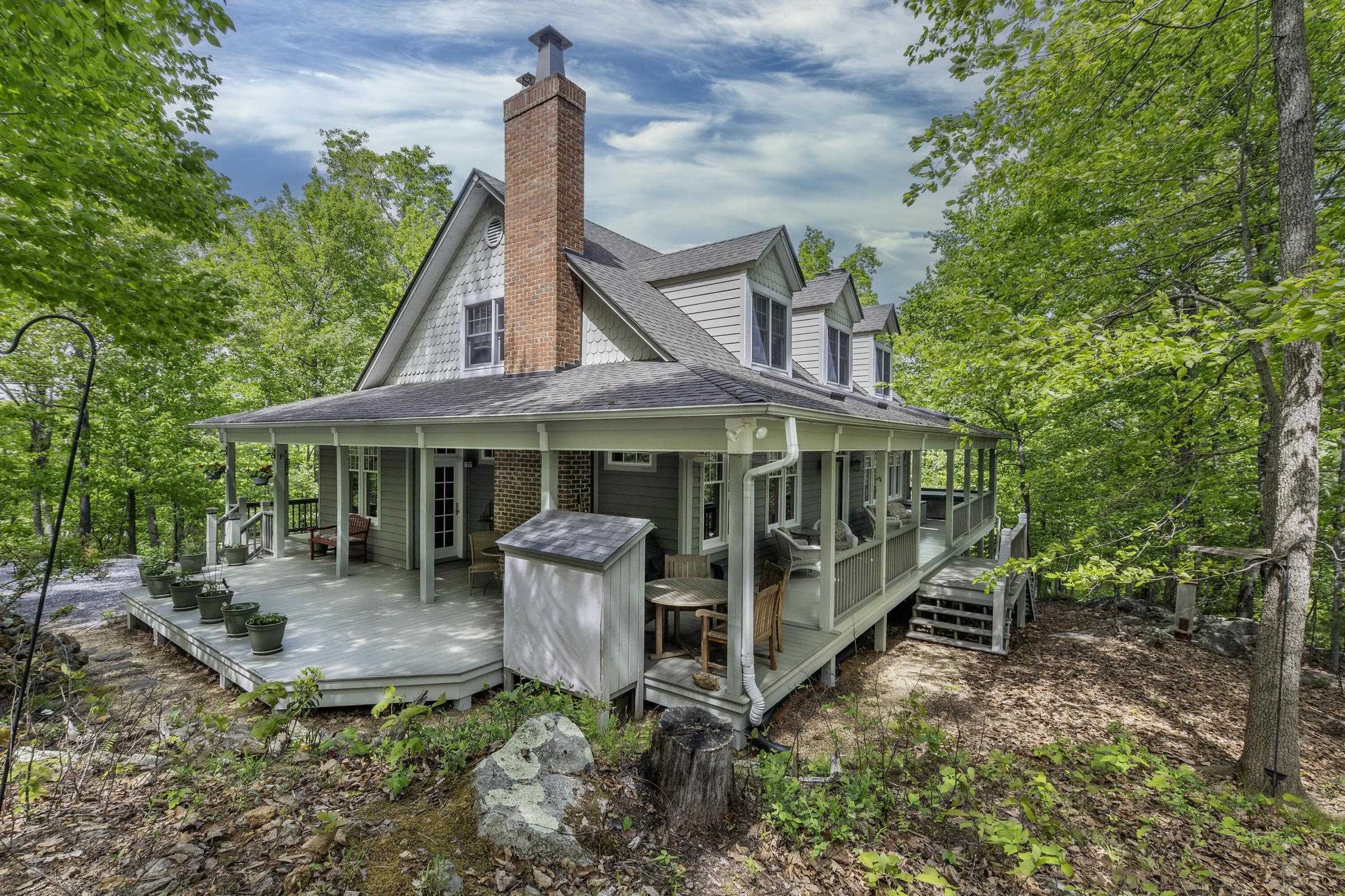 Wrap around, covered porches offer plenty of areas to entertain, or curl up with a good book. Wrap around, covered porches offer plenty of areas to entertain, or curl up with a good book.