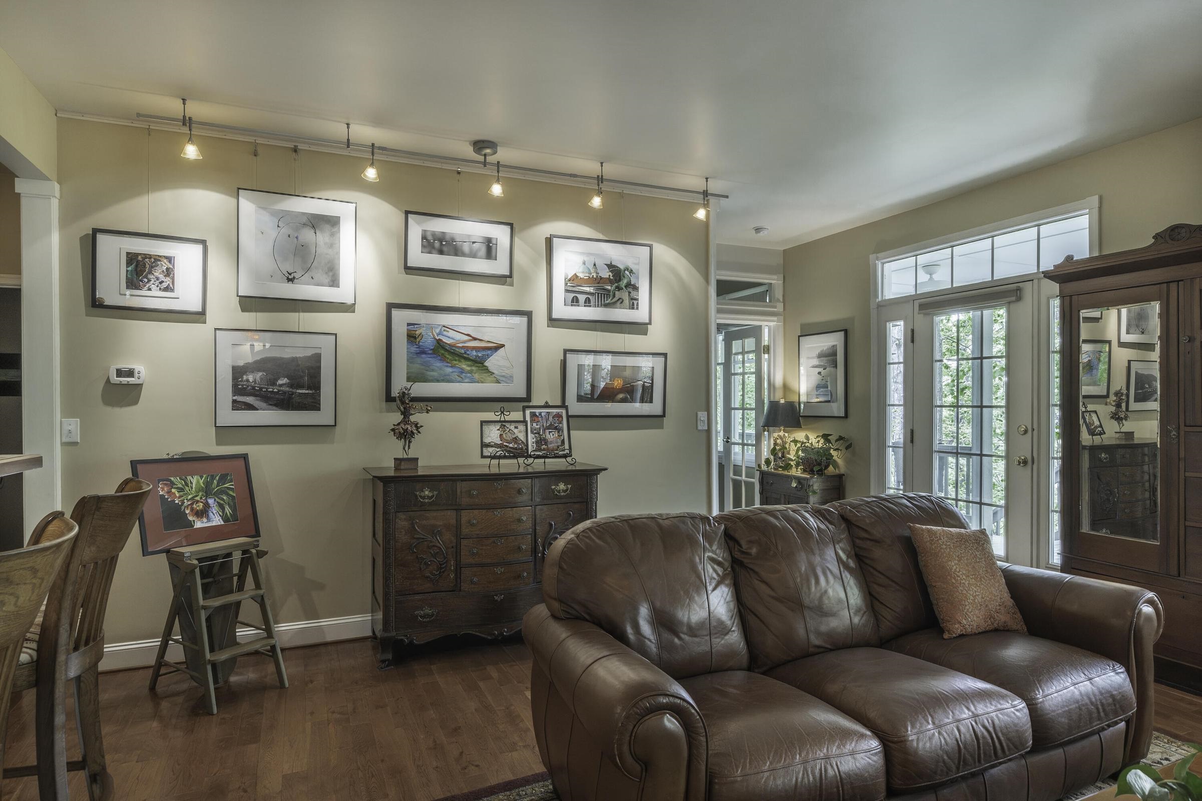 The kitchen opens into the Living room. High quality construction materials; gorgeous floors, trim The kitchen opens into the Living room. High quality construction materials; gorgeous floors, trim