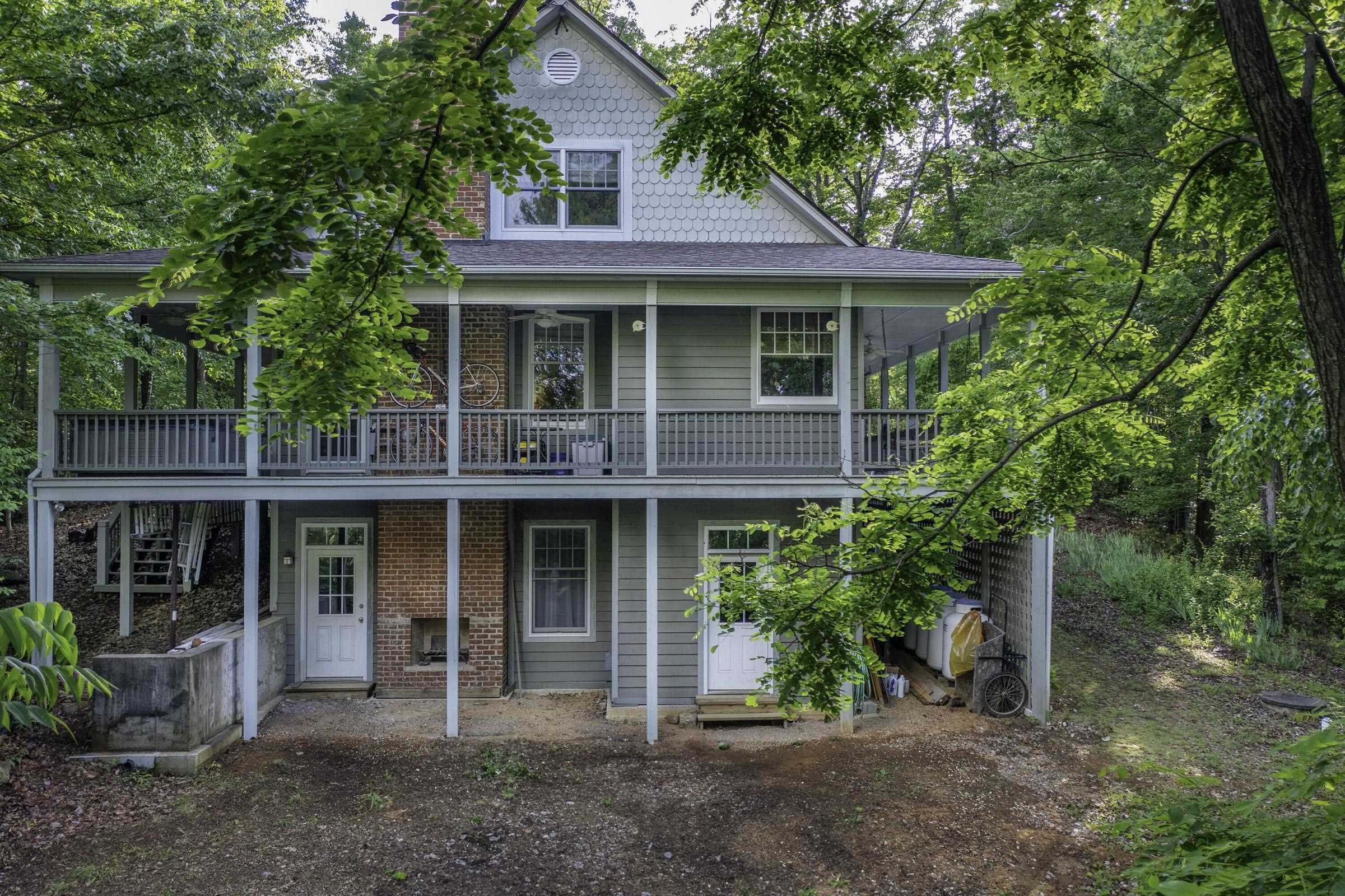Elevated porch wraps around the back of the house. Lower level Elevated porch wraps around the back of the house. Lower level