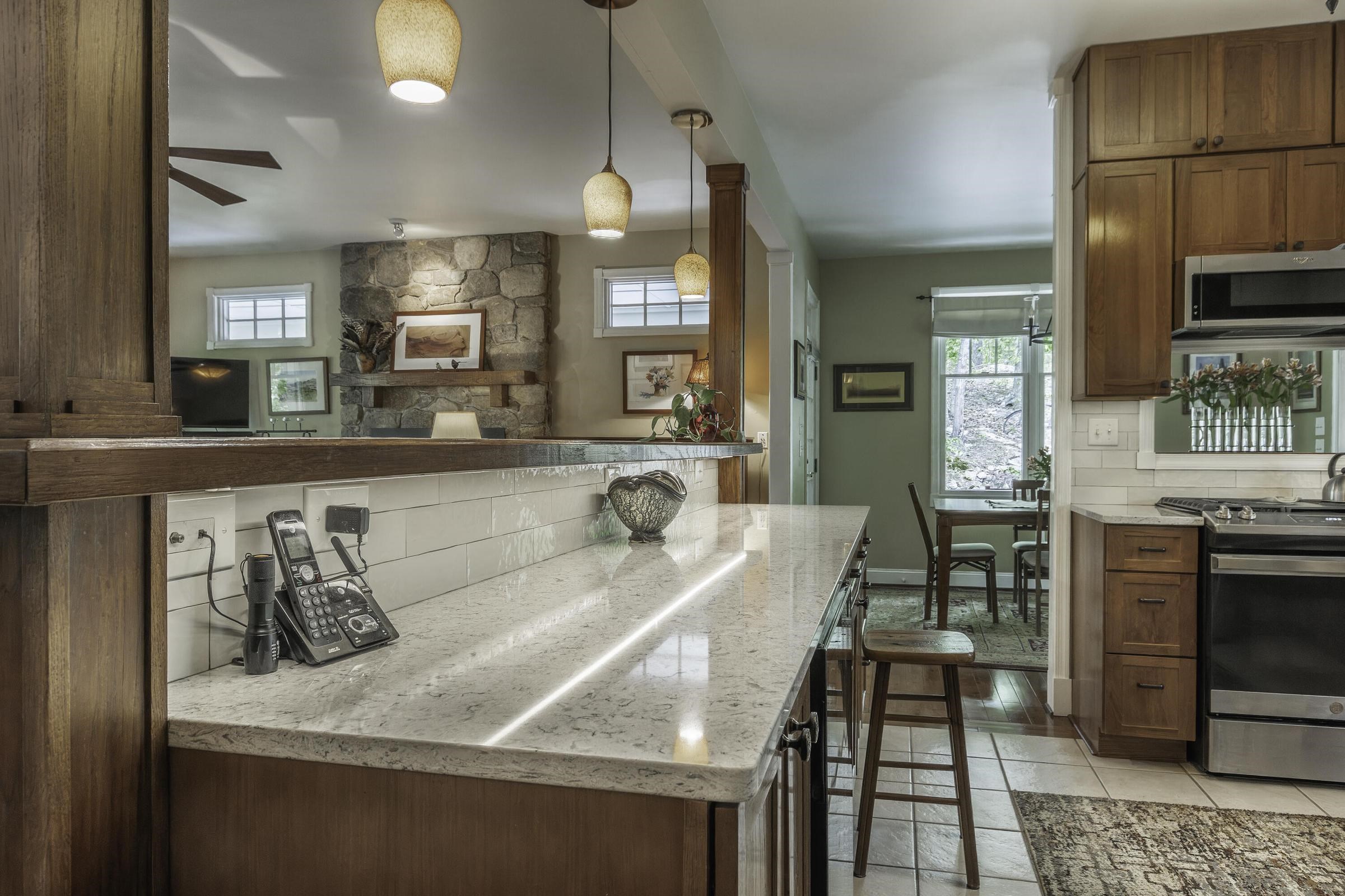 New Quartz countertops and ceramic tile backsplash. New Quartz countertops and ceramic tile backsplash.