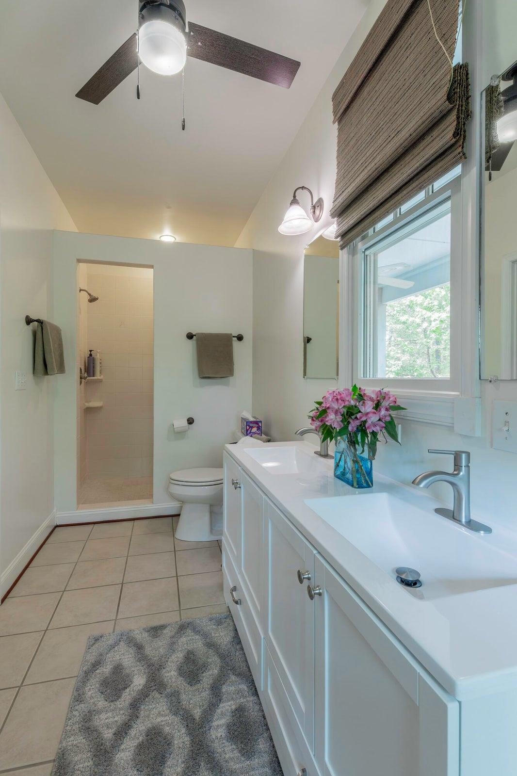 Primary bath also features a spacious walk-in shower Primary bath also features a spacious walk-in shower