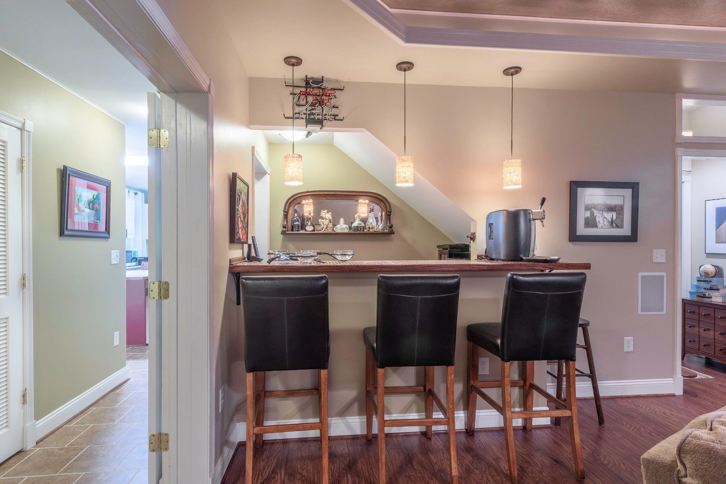 Serve yourself at the beautifully crafted bar. Serve yourself at the beautifully crafted bar.