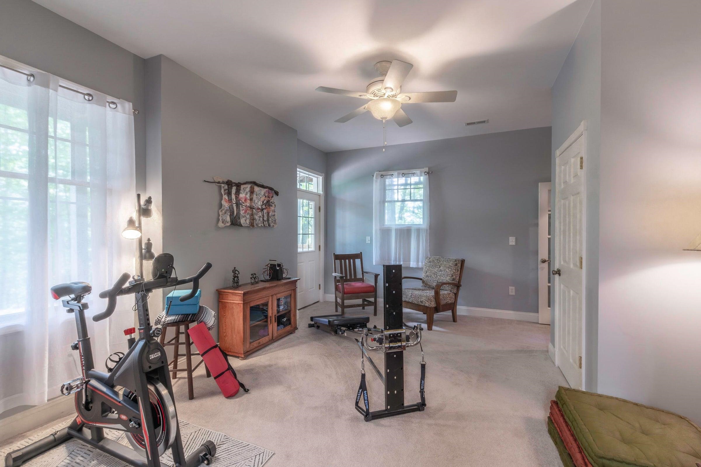 Lower level room has its' own entrance from the rear patio. Lower level room has its' own entrance from the rear patio.