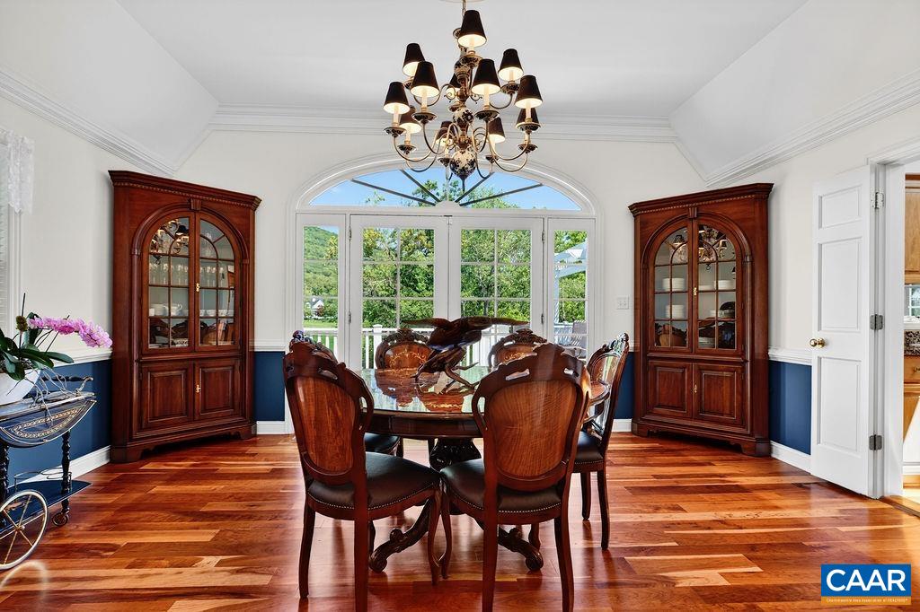 Formal dining room offers wonderful mountain views and has an access to the rear deck.