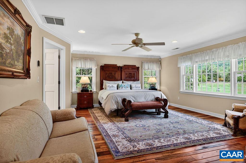 The expansive primary suite serves as its own private and spacious retreat