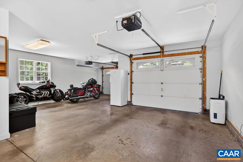 An exceptional storage area, butler’s pantry, and mudroom connect the kitchen to the garage.