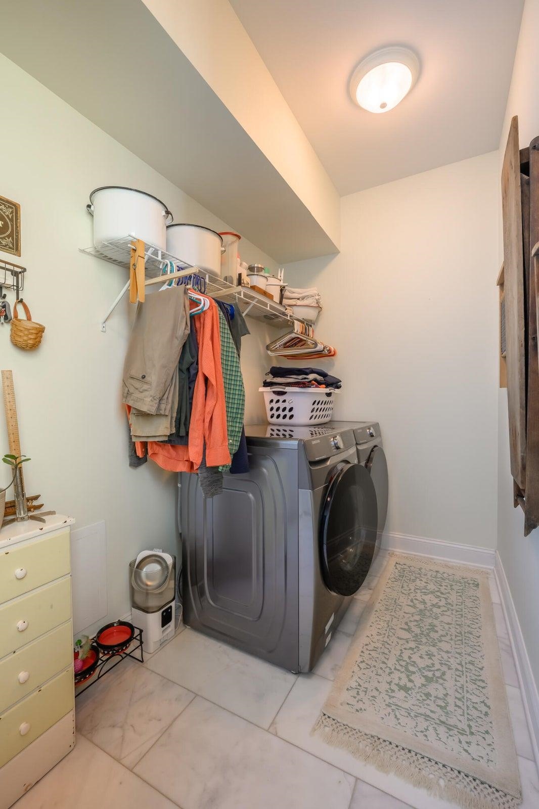 A dedicated laundry room adds everyday convenience.