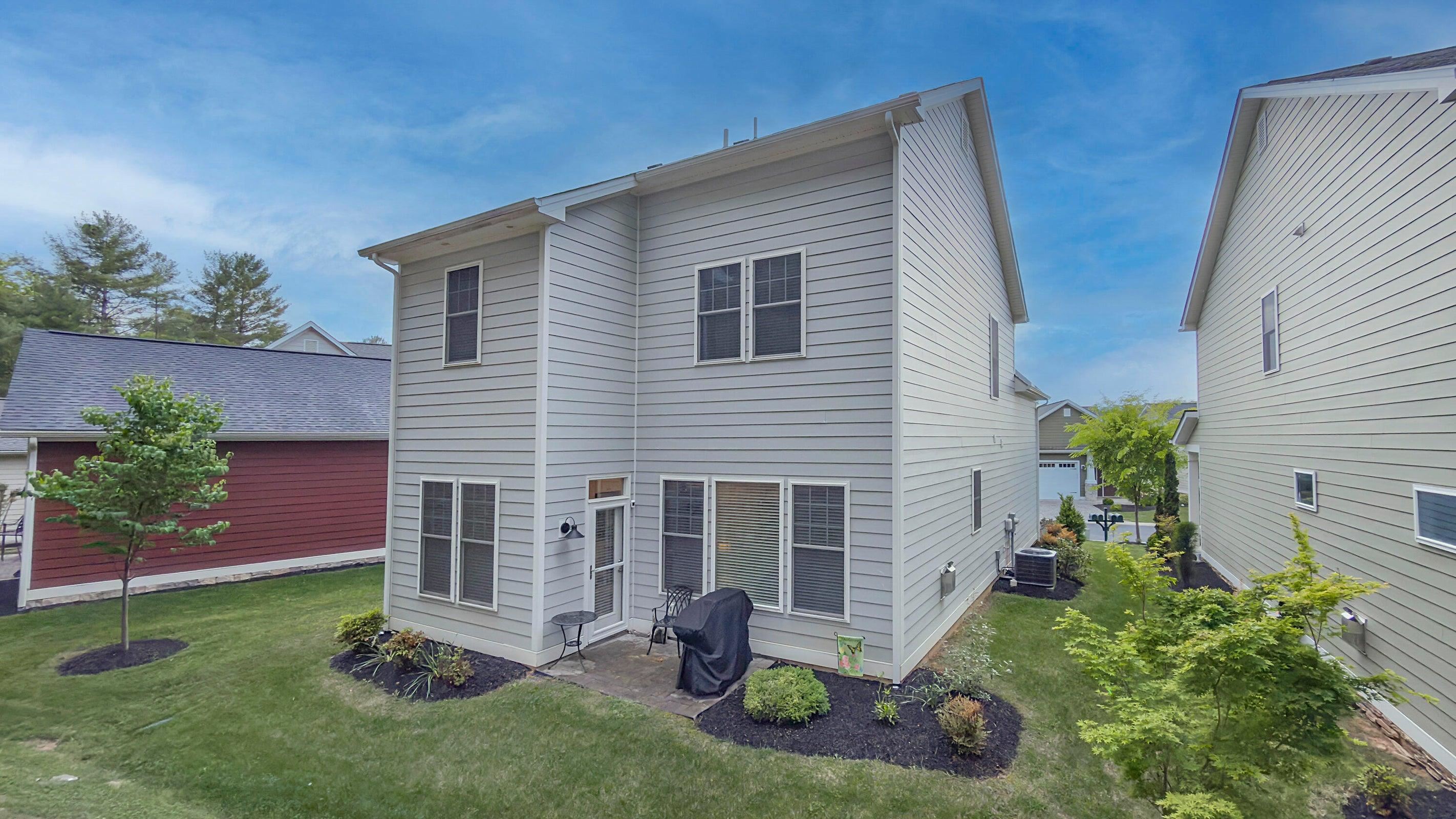 The home’s rear patio and the community pavilion with gas fire pit provide usable outdoor space without added upkeep.