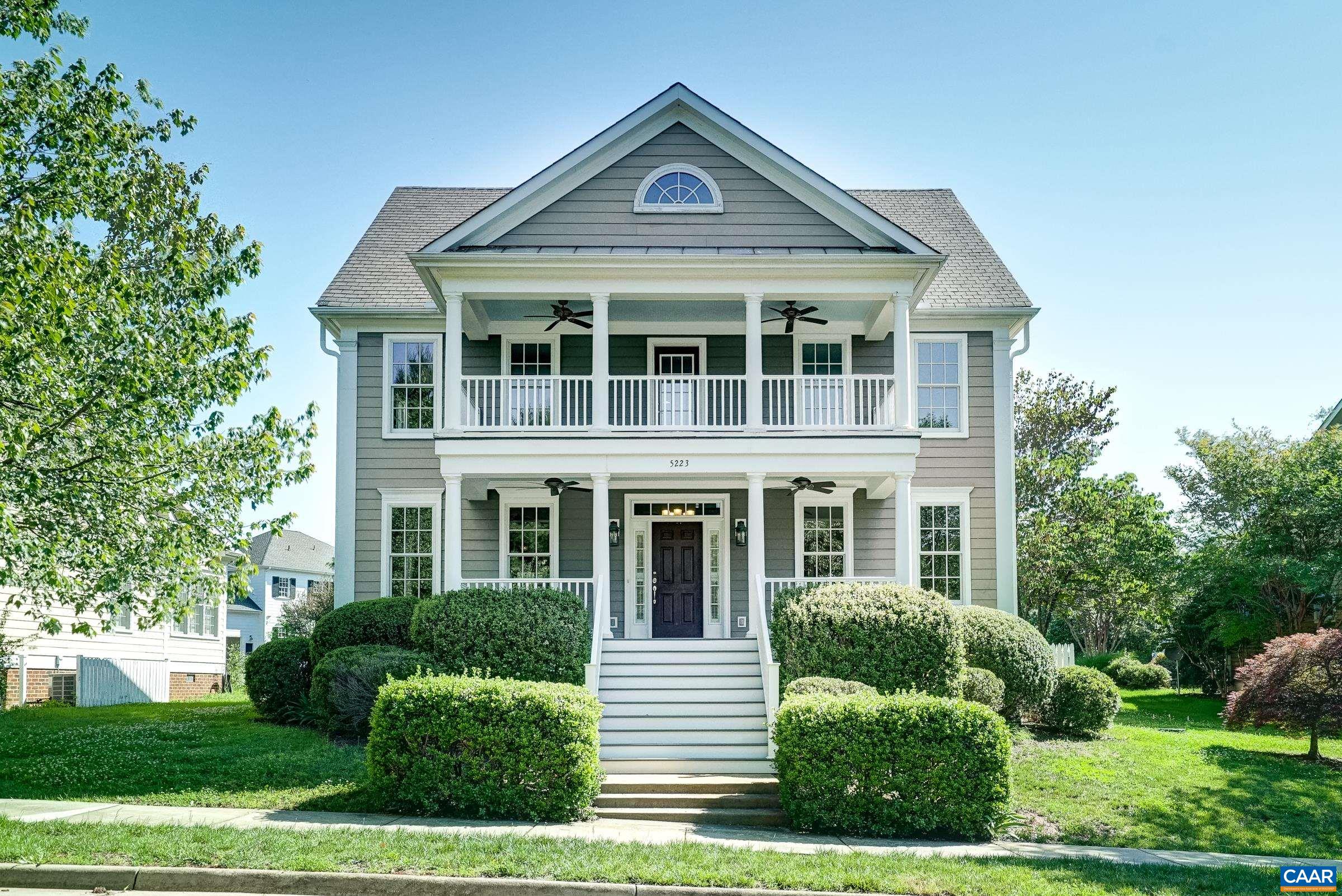 Beautiful traditional home overlooking the green common area in a quiet section of Old Trail.