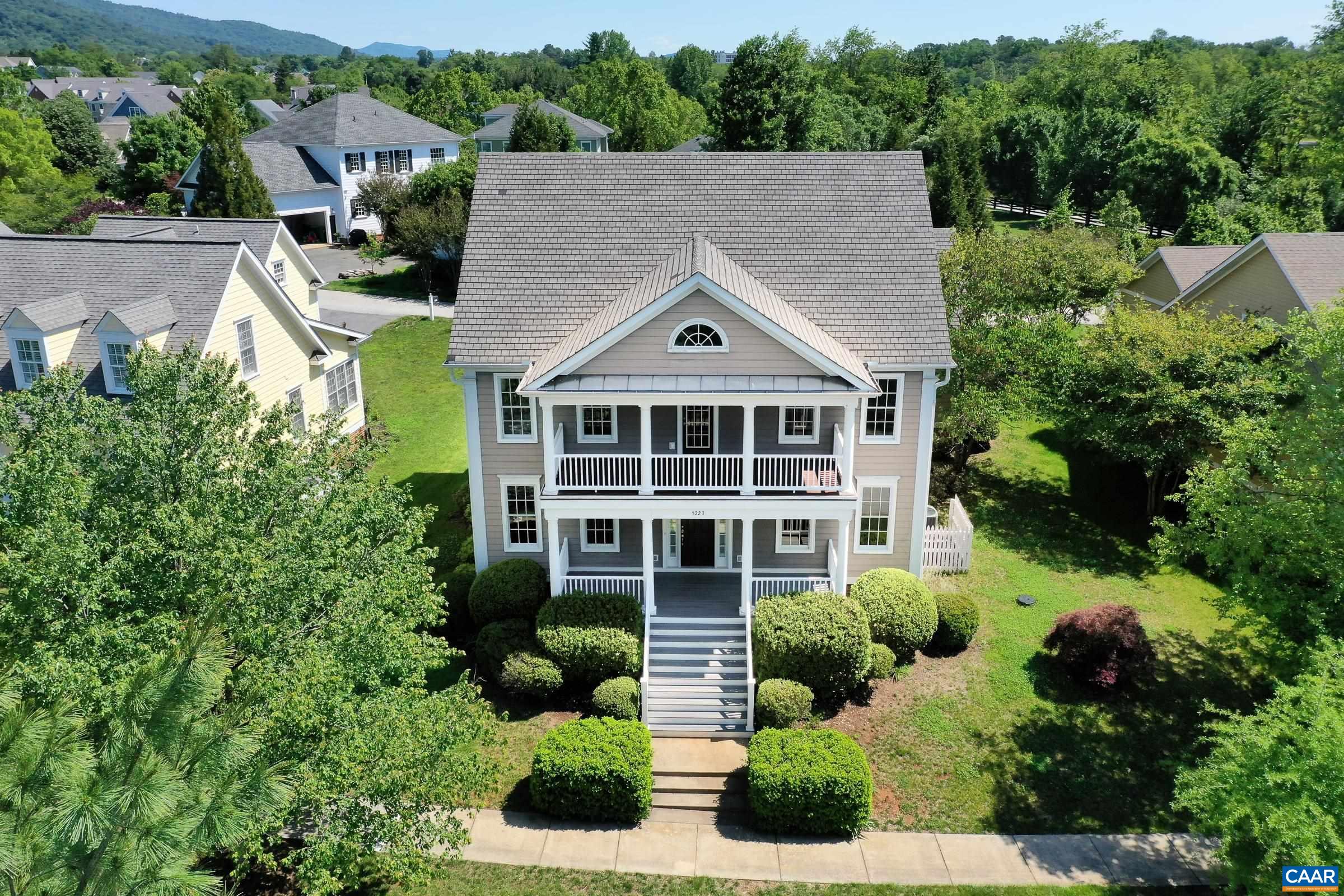Beautiful traditional home overlooking the green common area in a quiet section of Old Trail.