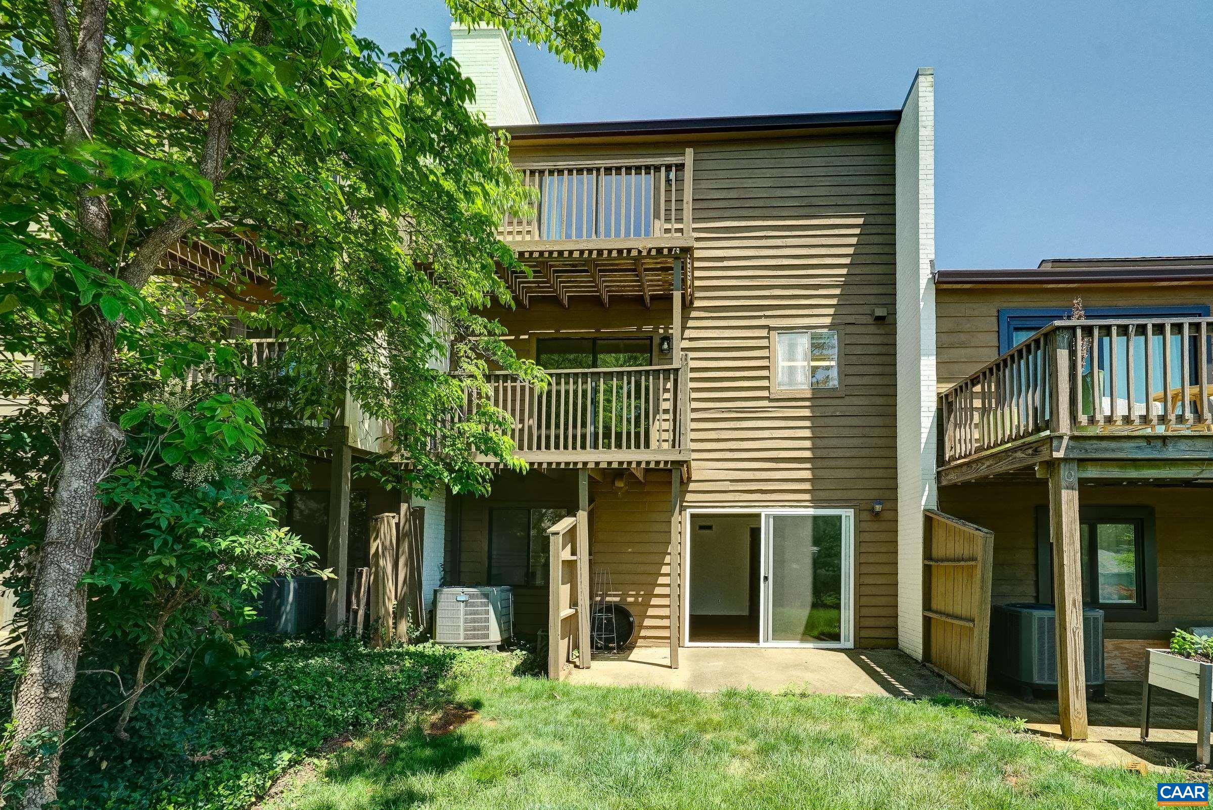 Lots of outdoor living with two balconies, and a patio on the basement level.