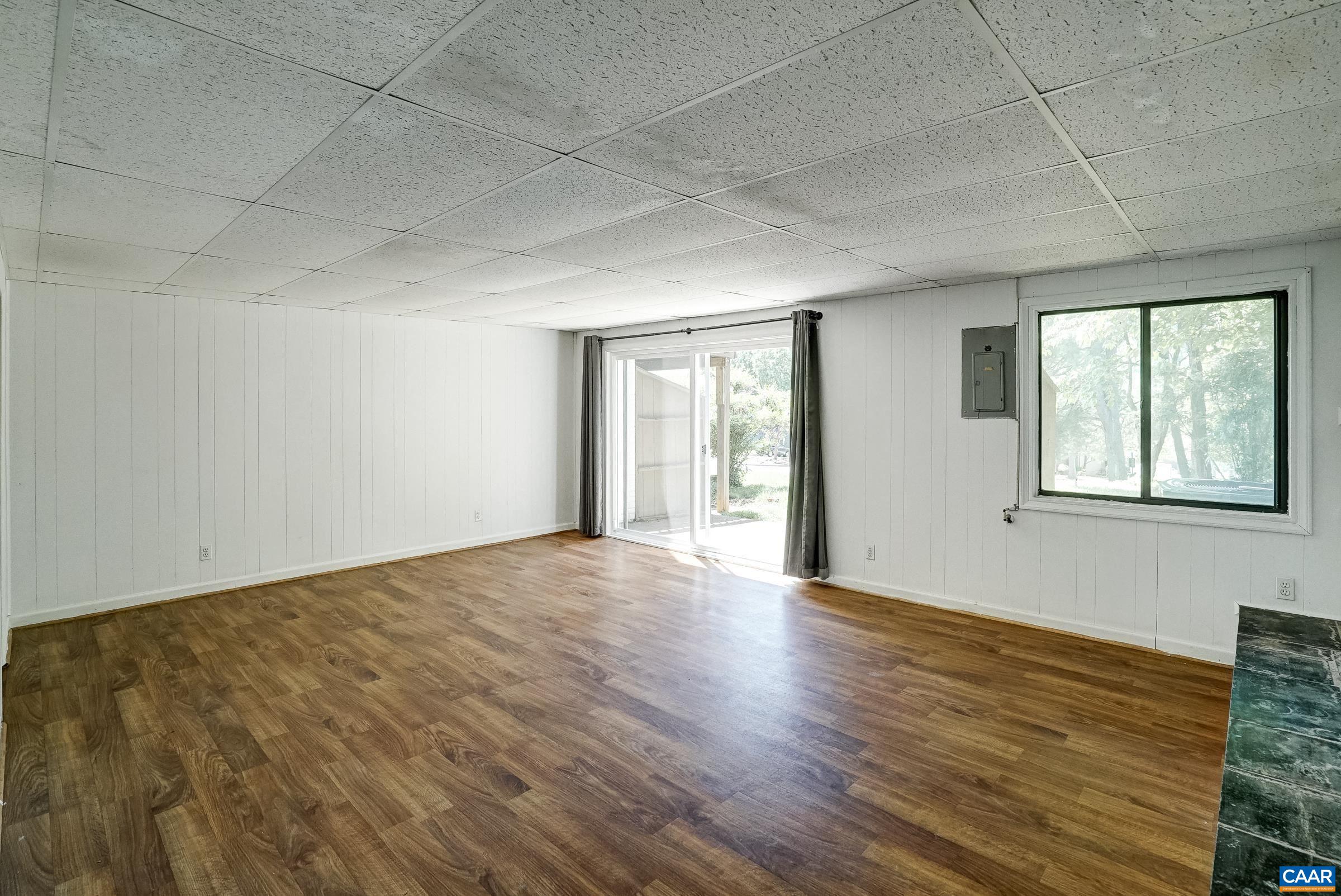 Walk-out finished basement with lvp flooring.