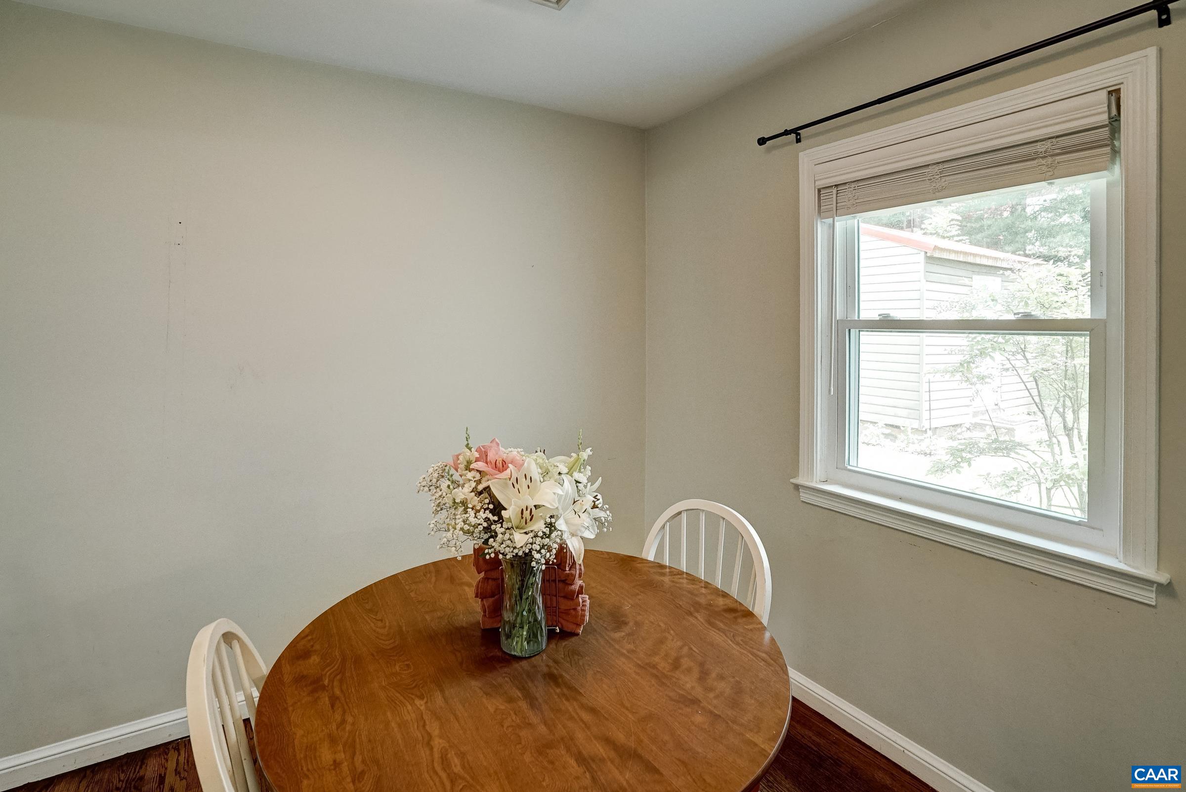Dining area opens to the kitchen.