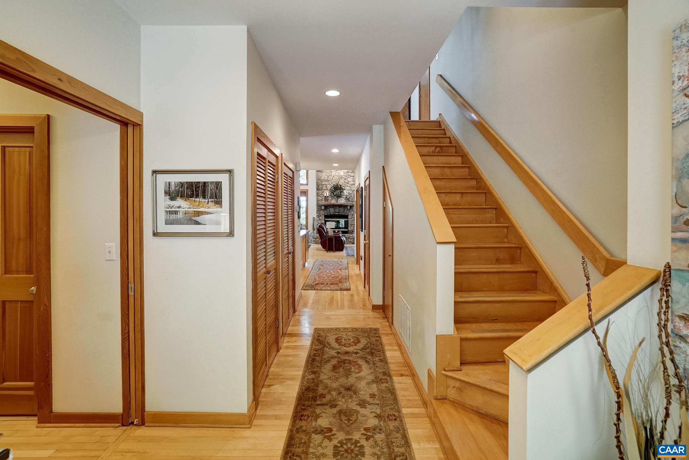 Inside the home, hardwood floors, neutral paints and natural wood enhance the charm!