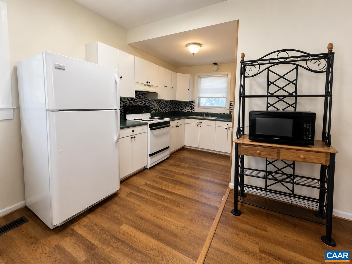 Just past the living room is the kitchen.