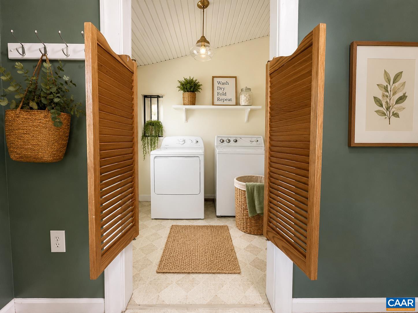 With a little decorating the foyer and laundry room can be a captivating space.
