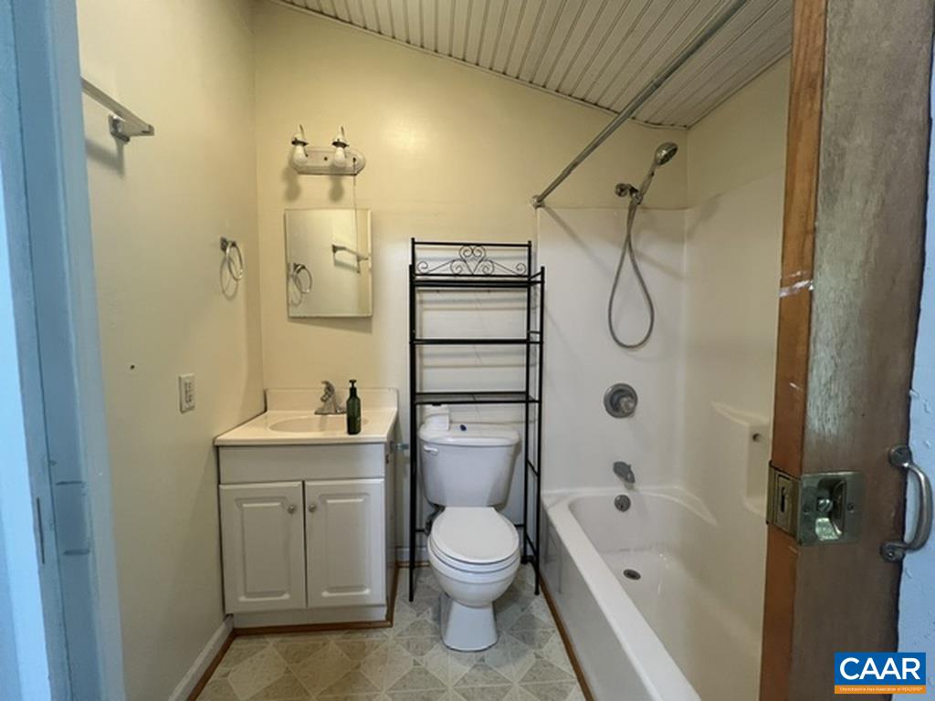 Then look to your right. There's the full bathroom.