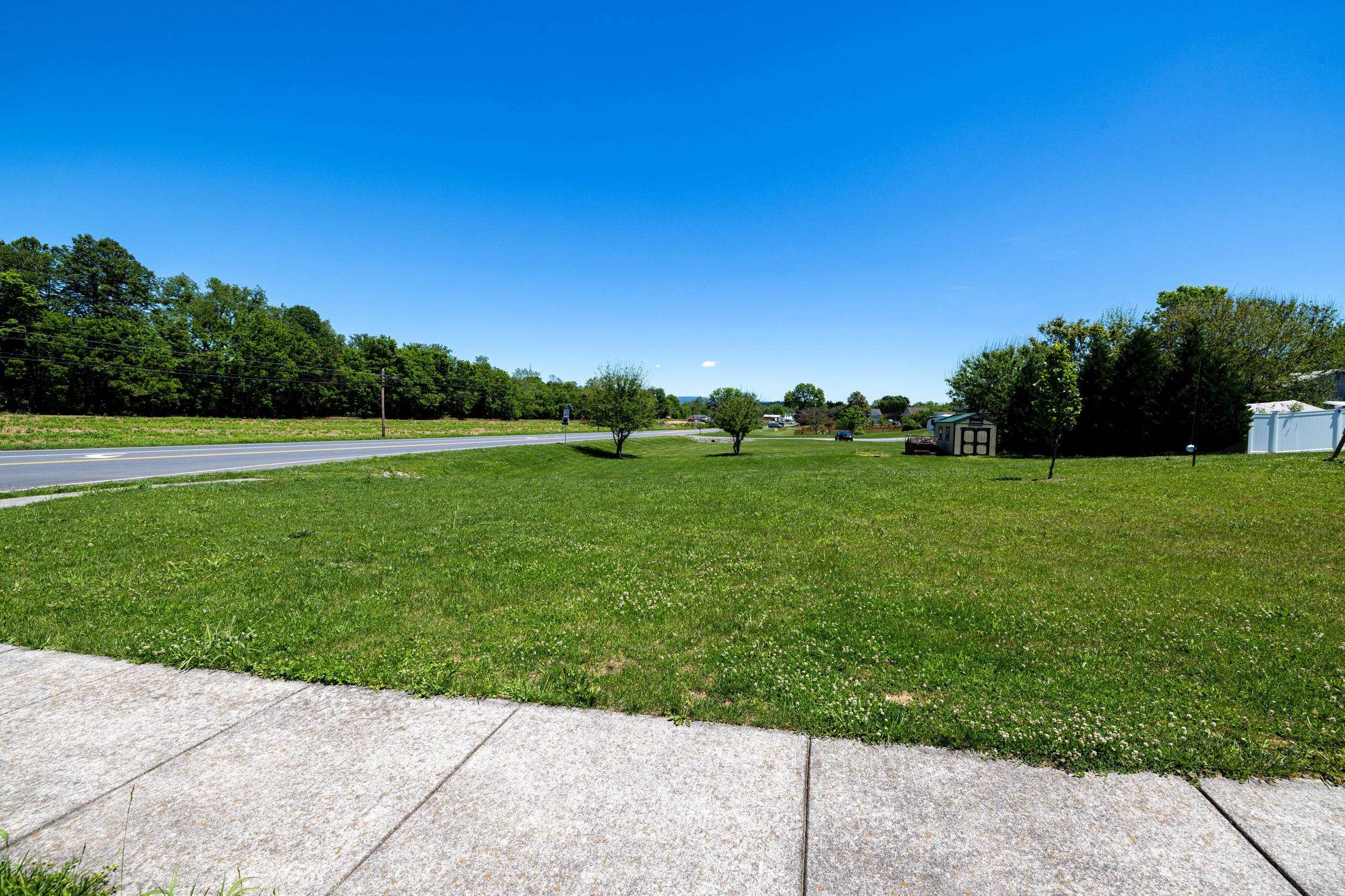 on front of lot and partially on Rt259 side.