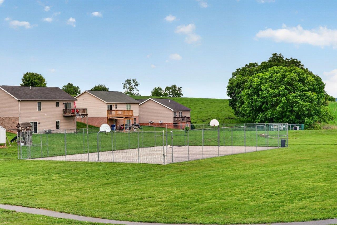 A basketball court is located directly behind the property A basketball court is located directly behind the property