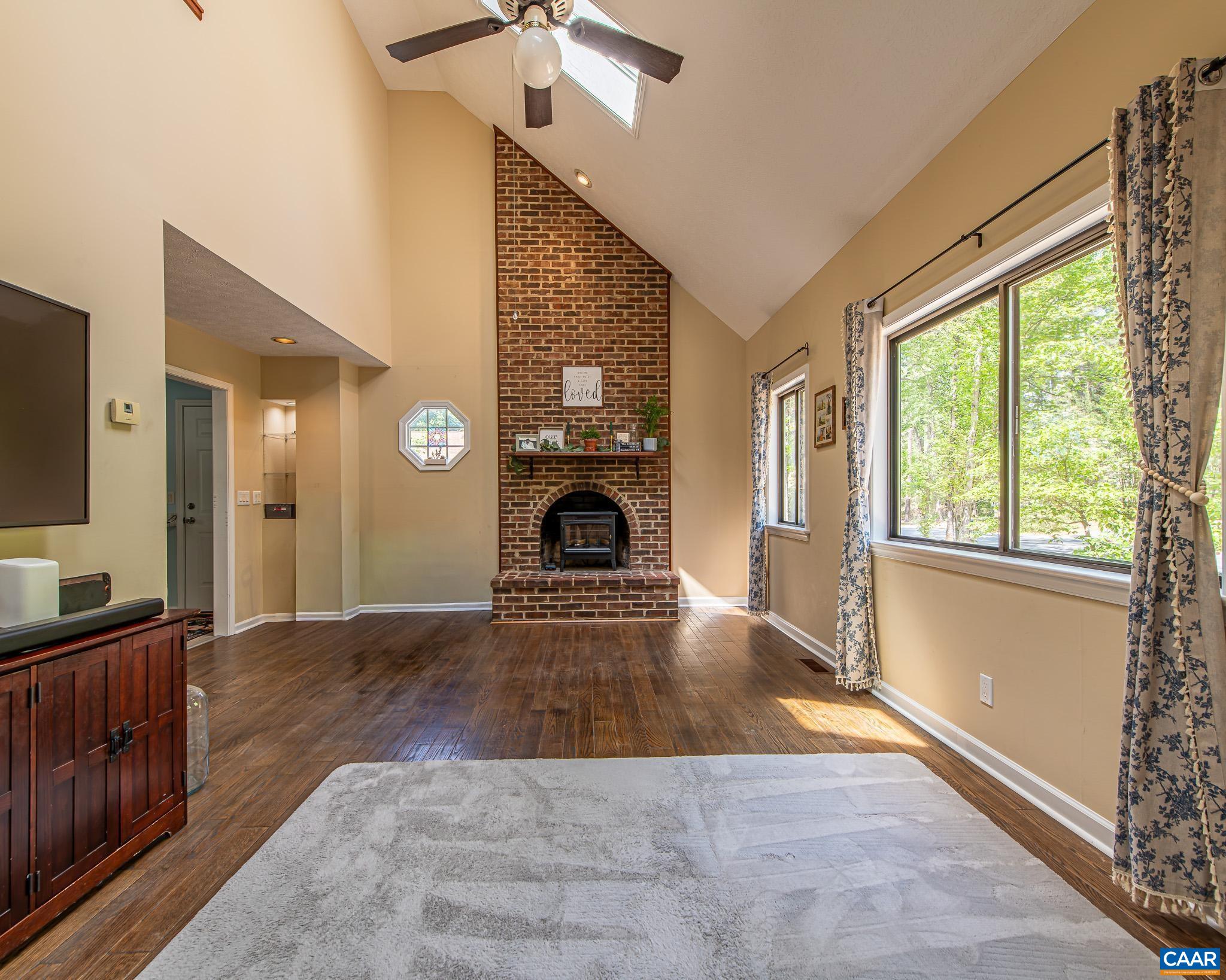 Floor To Ceiling Brick Fireplace (has been sealed by current owner - electrial insert in place). Floor To Ceiling Brick Fireplace (has been sealed by current owner - electrial insert in place).