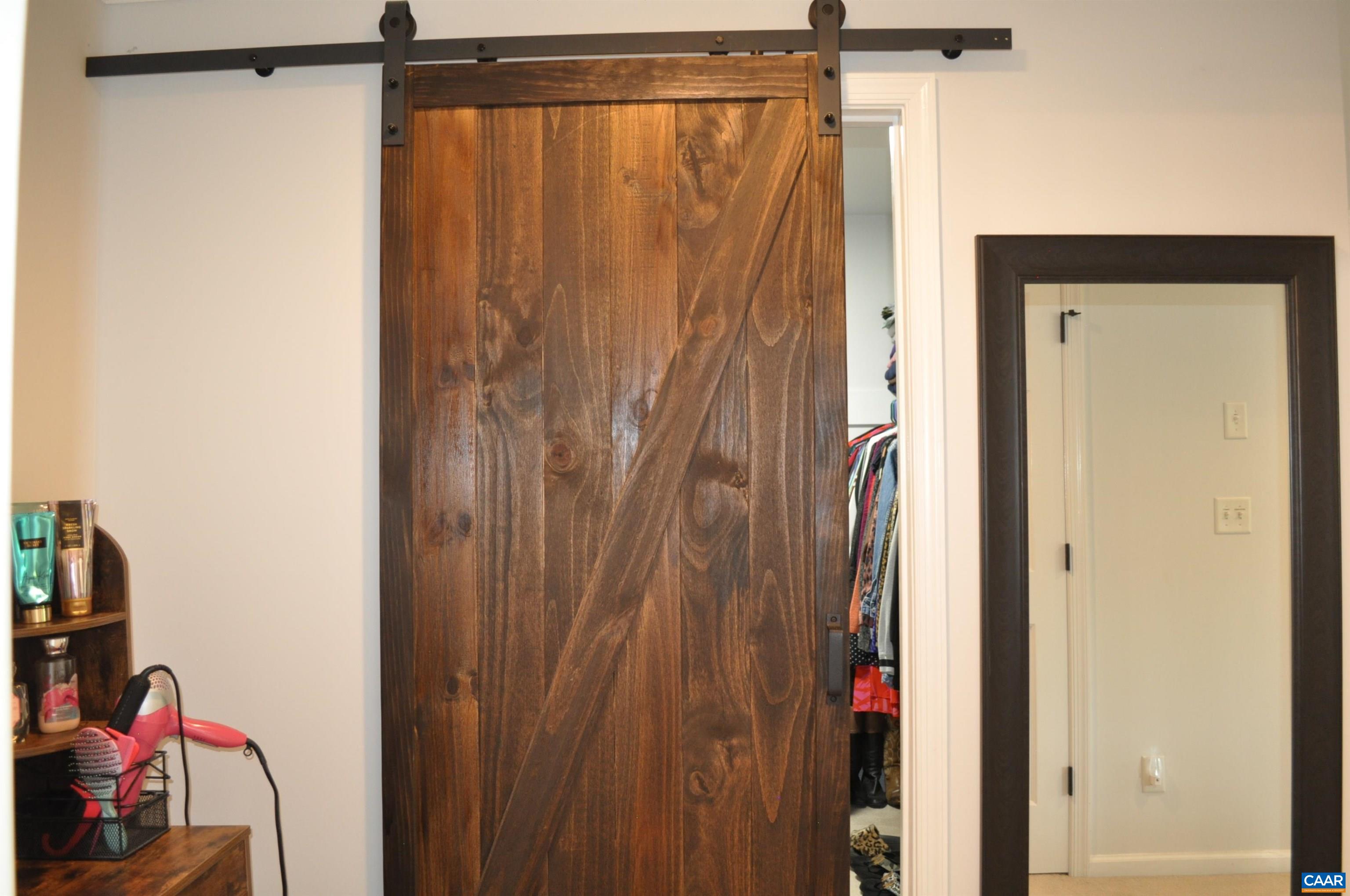 to primary walk-in closet to primary walk-in closet
