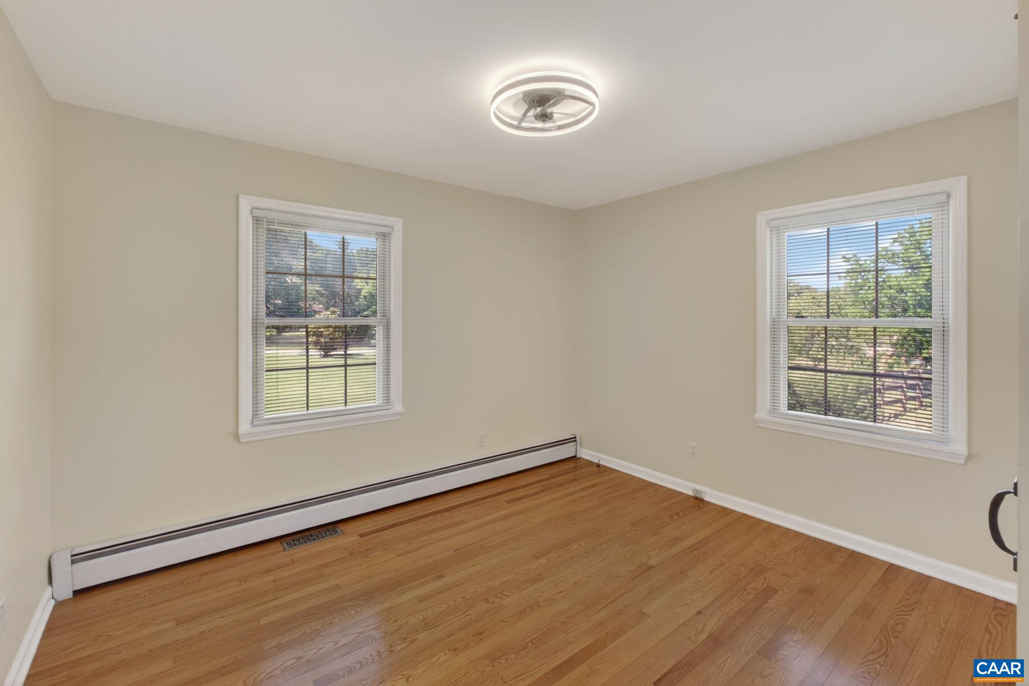One of two additional upstairs bedrooms.