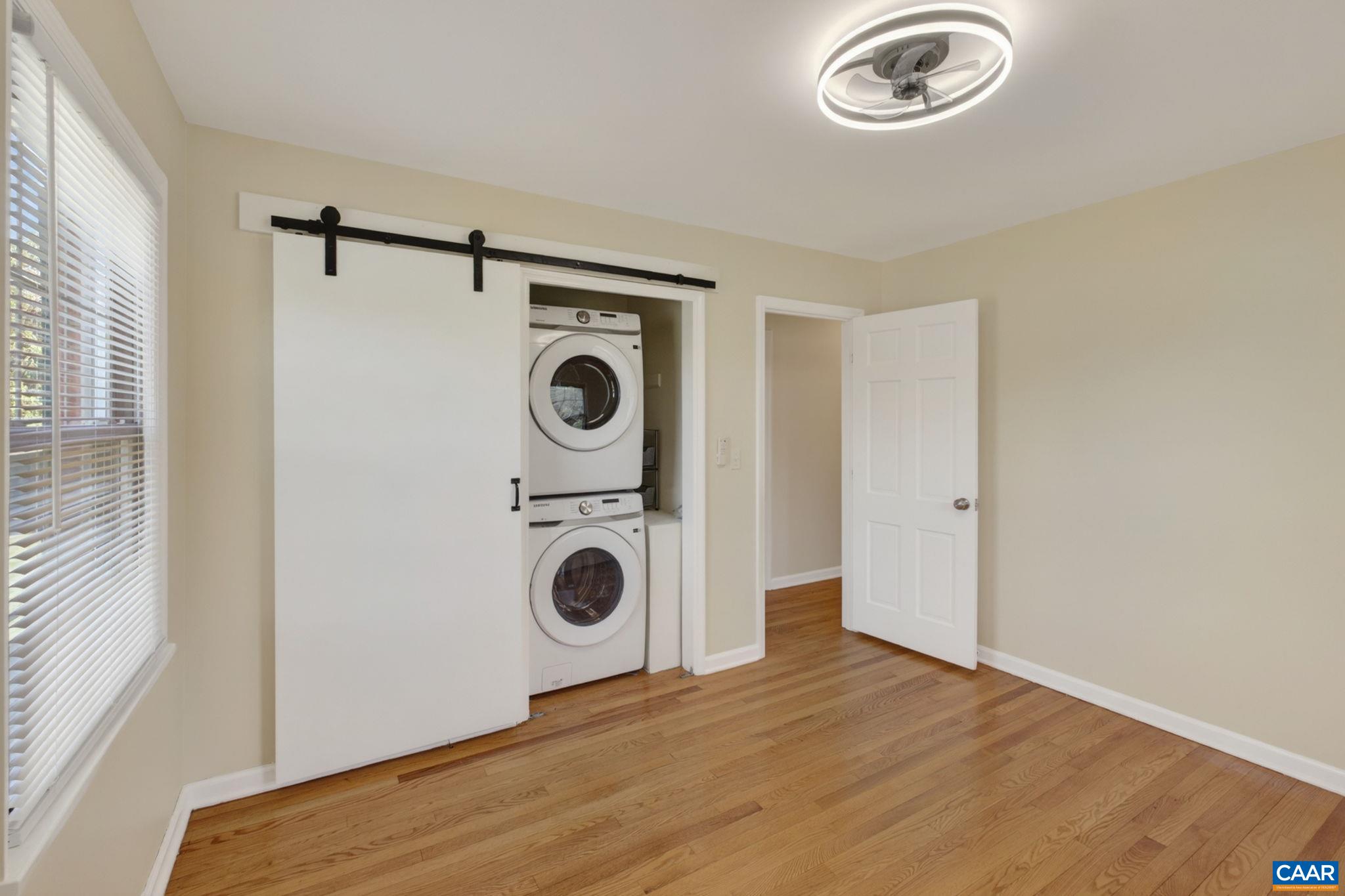 Upstairs laundry with new washer/dryer for main floor living, or it can be re-located to the basement.