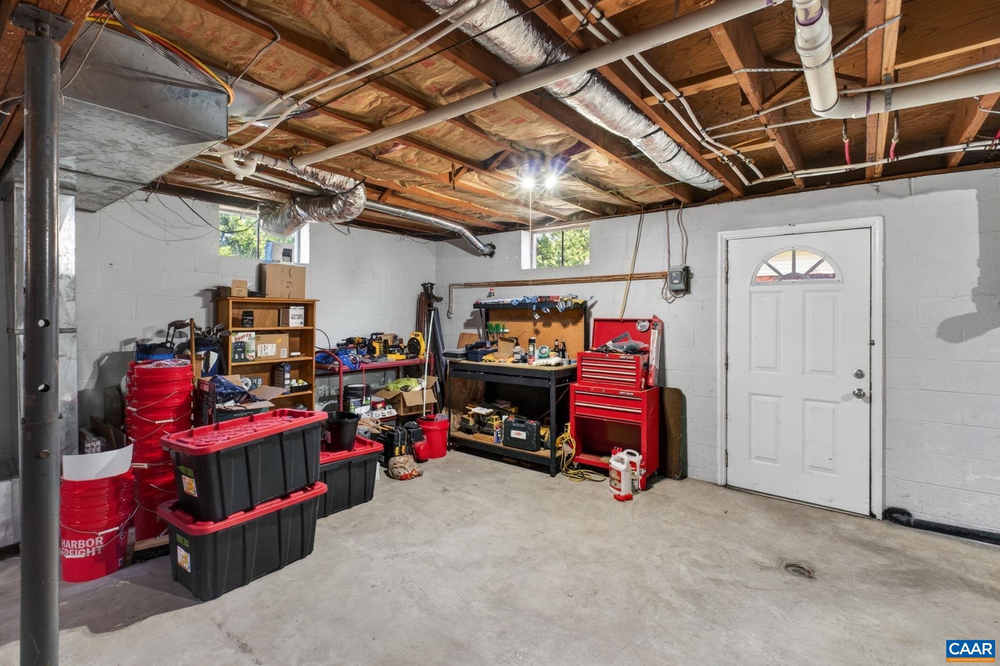 Basement with walk up and out access. Home has a newer HVAC system, and original hot water baseboard heat as backup.