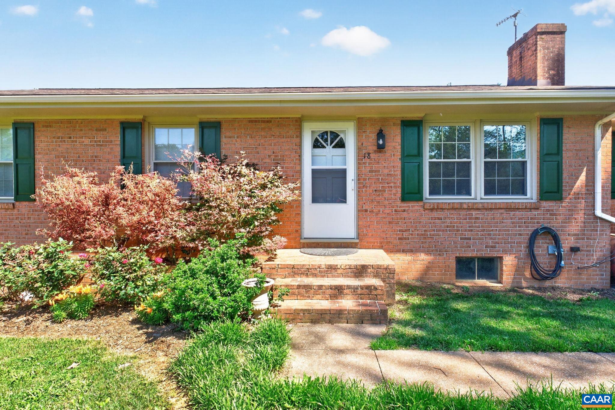 Front of the home is nicely landscaped.