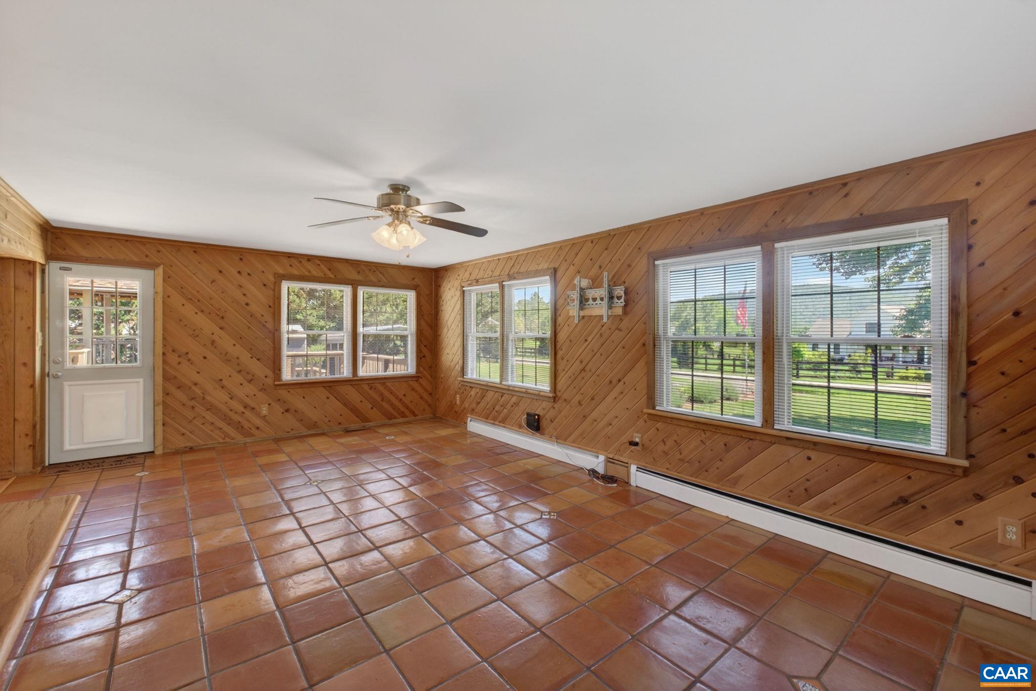 Large and bright family room with door to the deck.