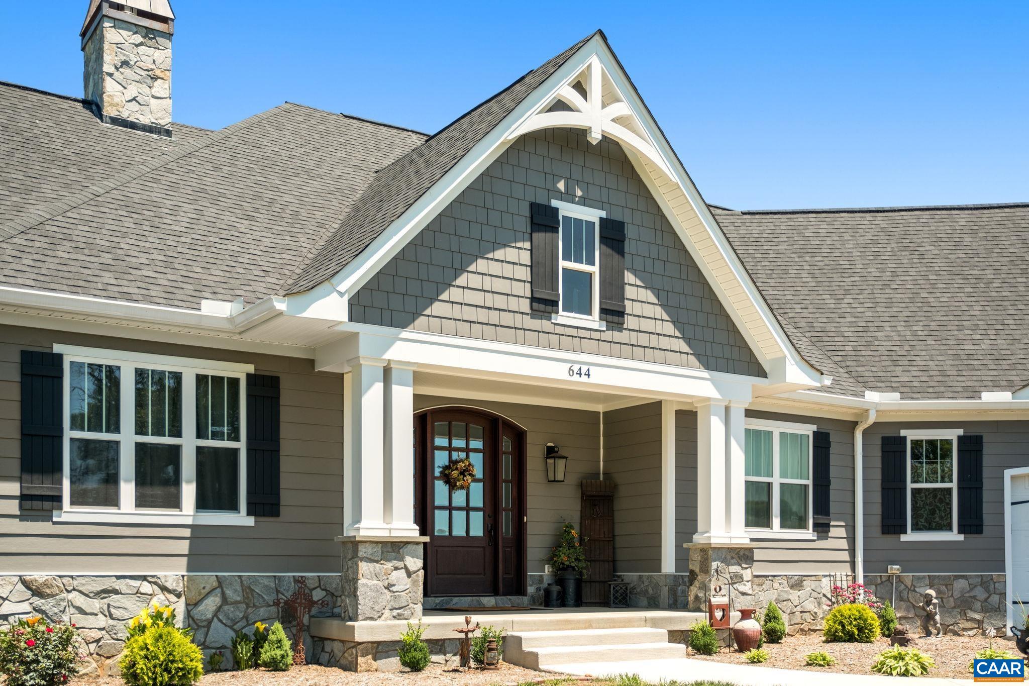 Welcome home to 644 Vista Heights Drive. The covered front porch features pillars and other decorative elements. Welcome home to 644 Vista Heights Drive. The covered front porch features pillars and other decorative elements.