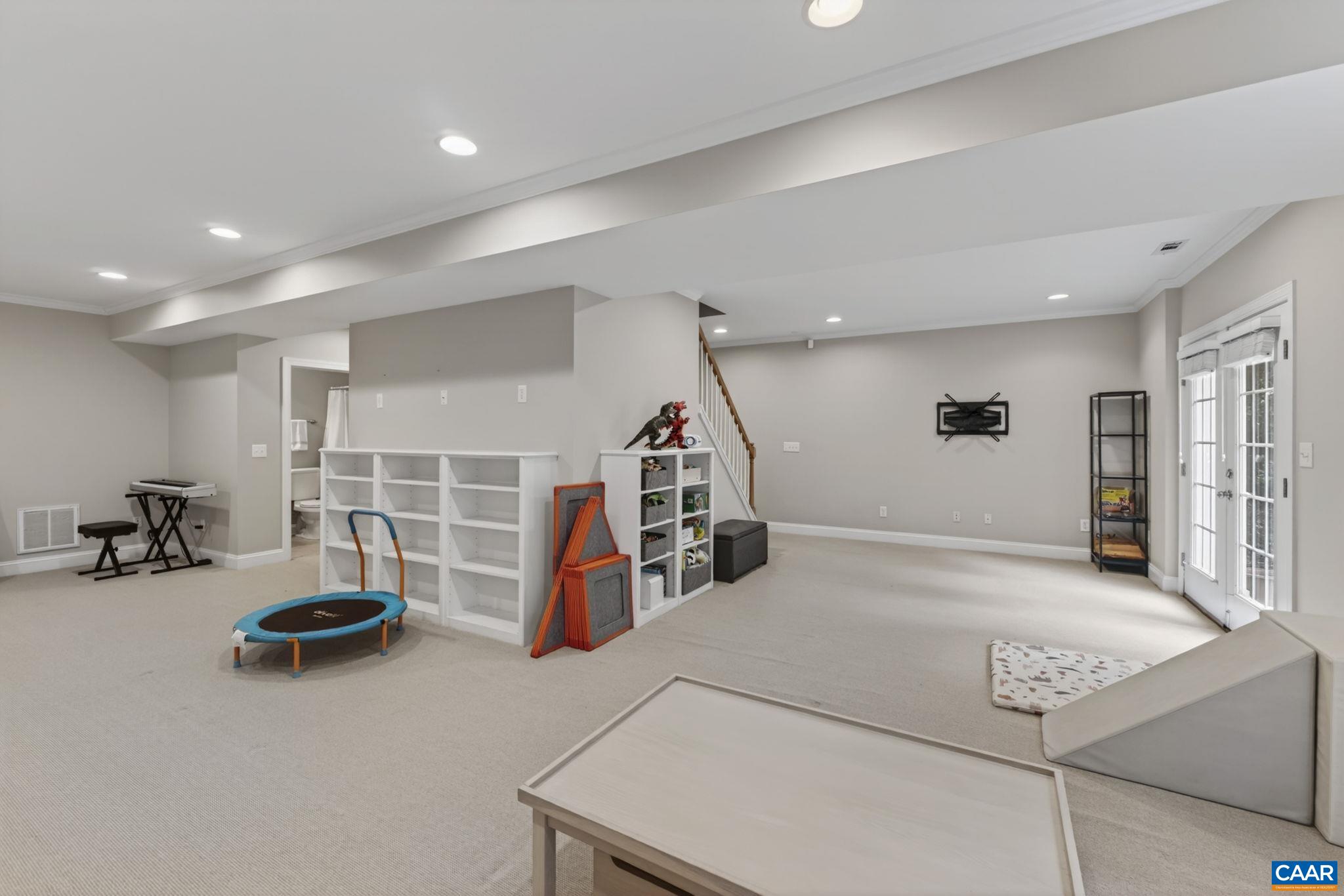 Large open basement has option for 5th bedroom + large unfinished storage room (not pictured) Large open basement has option for 5th bedroom + large unfinished storage room (not pictured)