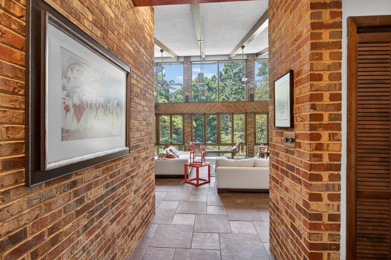 Opens up into the Living Room. Brick interior walls are just part of what this home unique Opens up into the Living Room. Brick interior walls are just part of what this home unique
