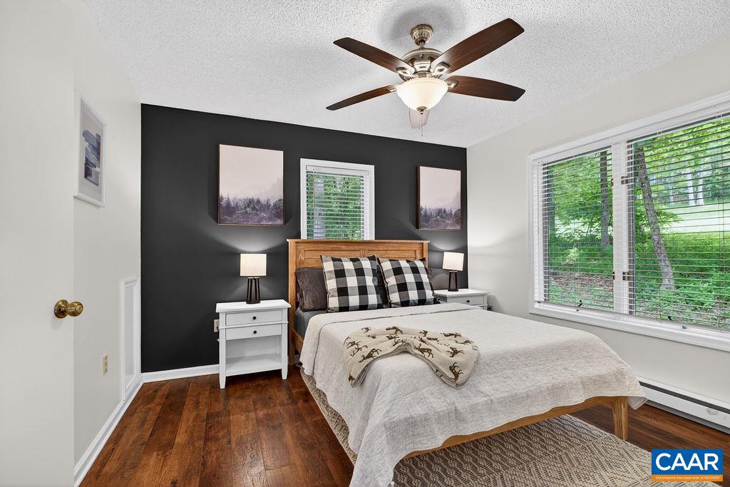 The main level offers two comfortable bedrooms that share a full bath. The main level offers two comfortable bedrooms that share a full bath.