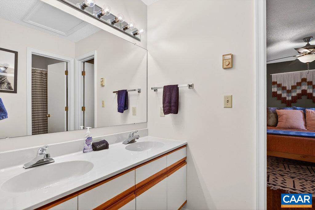 Shared guest bathroom upstairs. Shared guest bathroom upstairs.