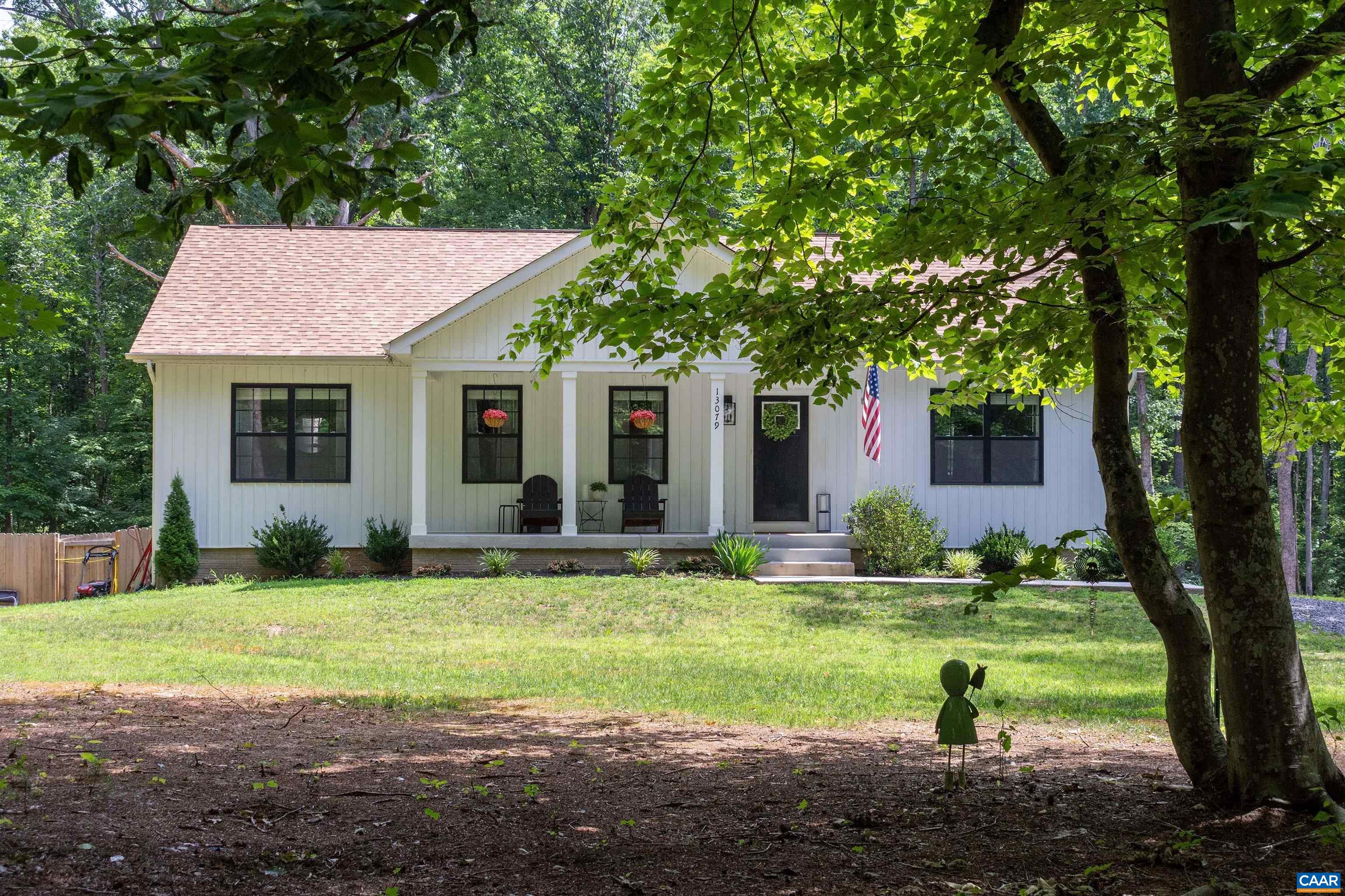 with partially shaded front yard. with partially shaded front yard.