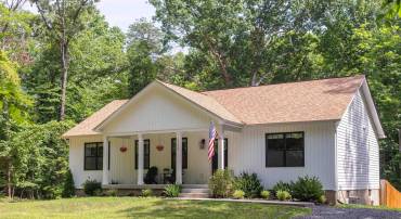 Upgraded Boxwood model by Ironwood Homes, well cared-for and like new, on 2+ acres.