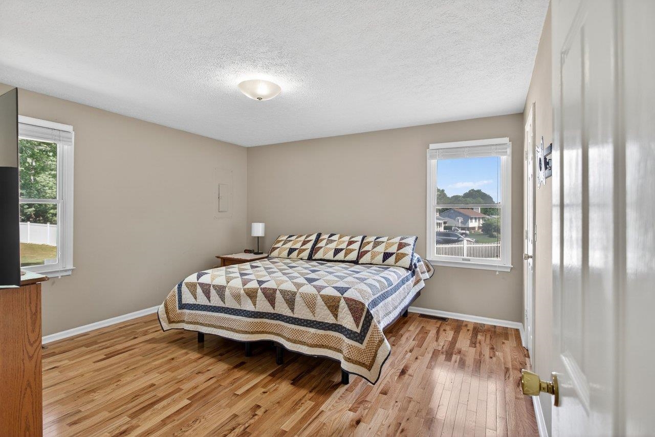 The second floor has its own living area with a split bed design.